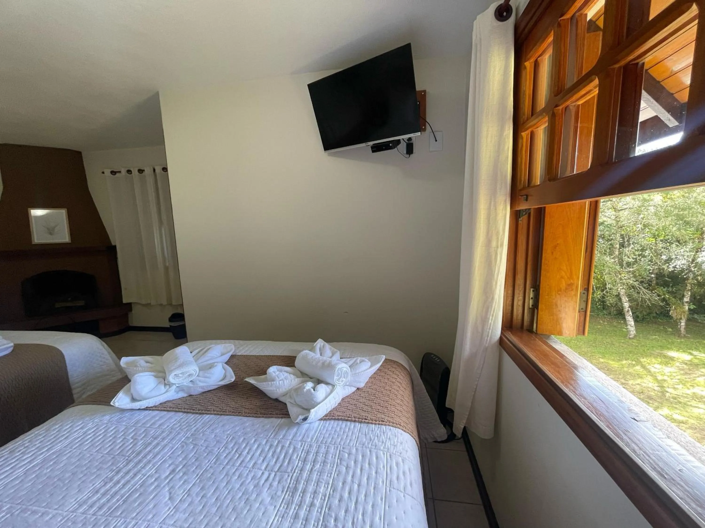 Bed in Pousada Flor de Lua Monte Verde