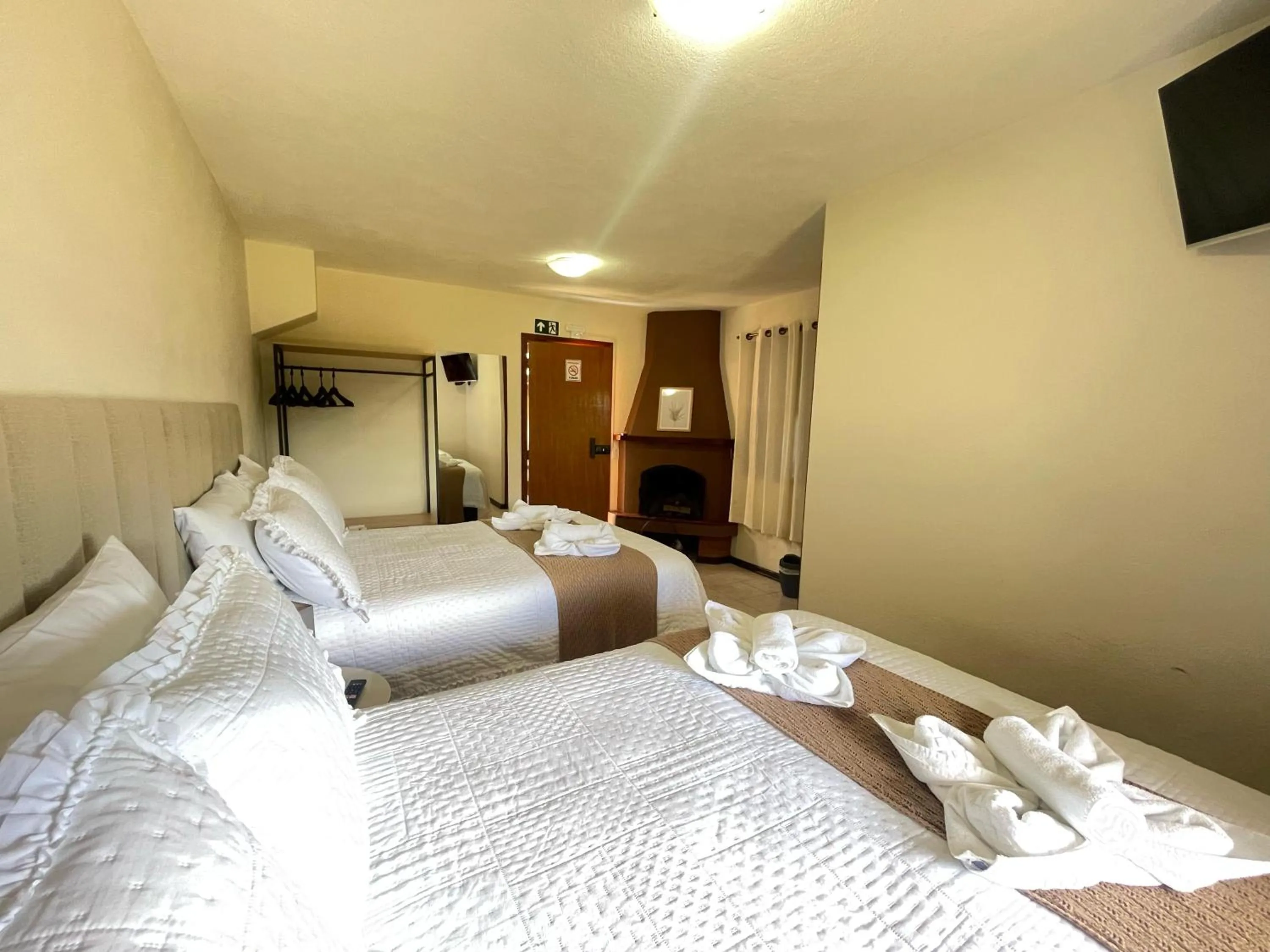 Bed in Pousada Flor de Lua Monte Verde