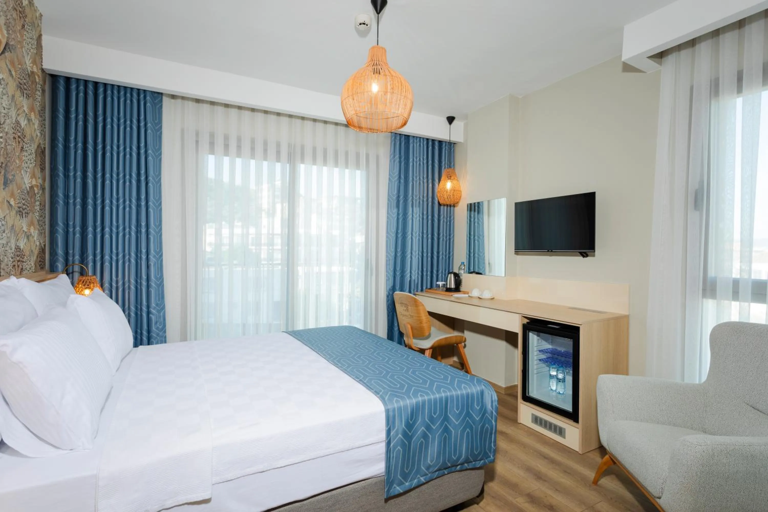 Photo of the whole room, Bed in Güllük Uno Elegance Otel