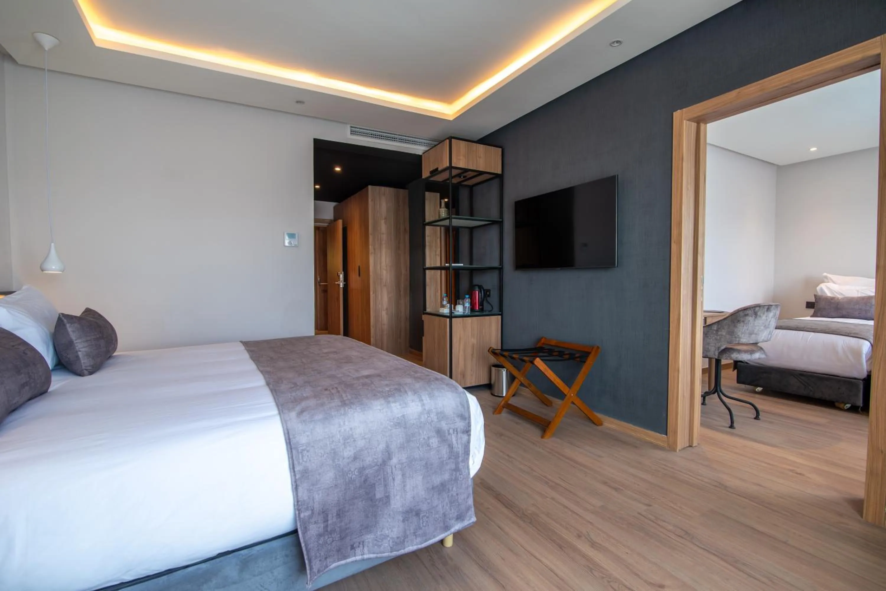 Communal lounge/ TV room, Bed in Dominium Palace