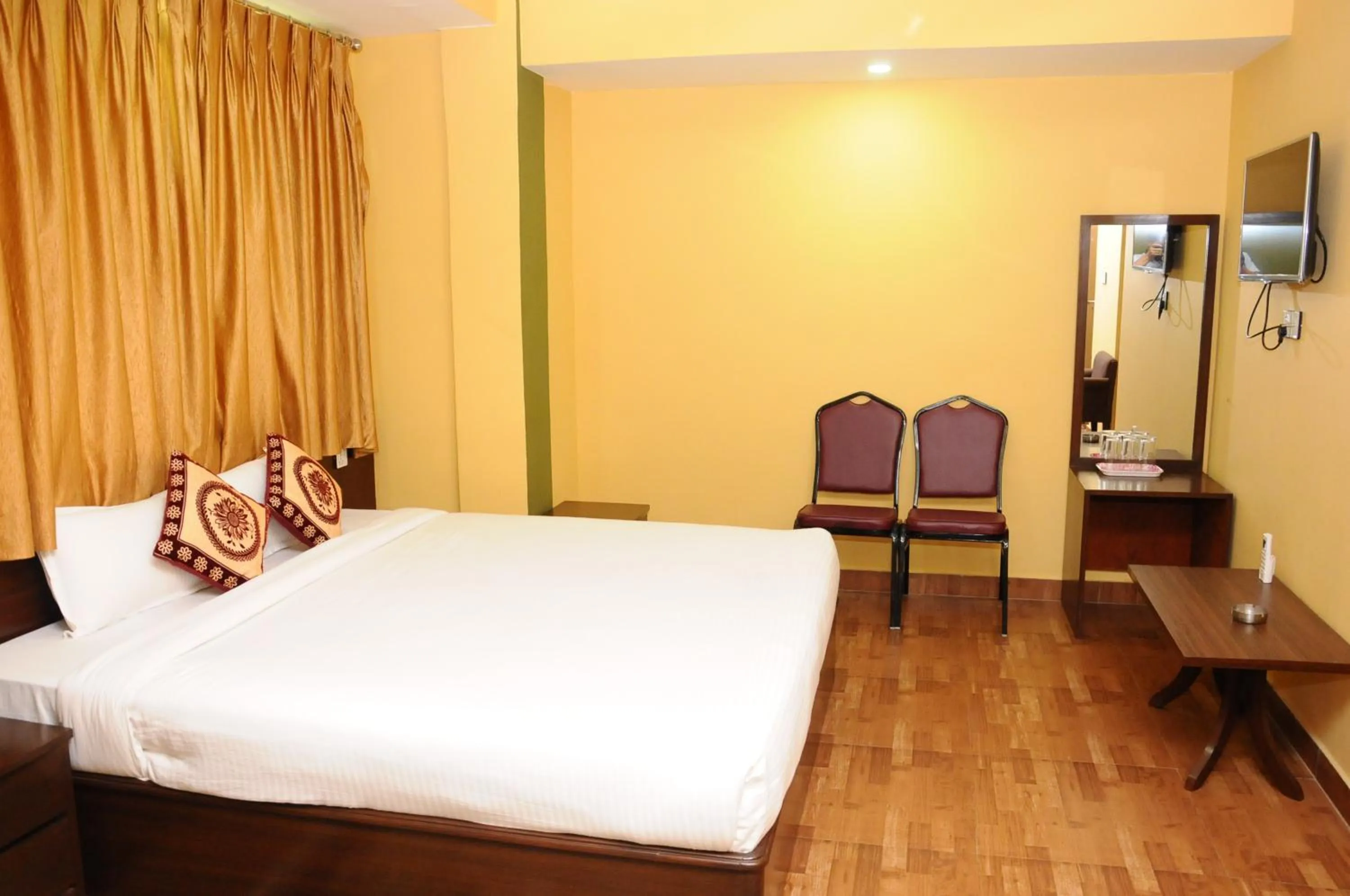 Bed in Rameshworam Hotel