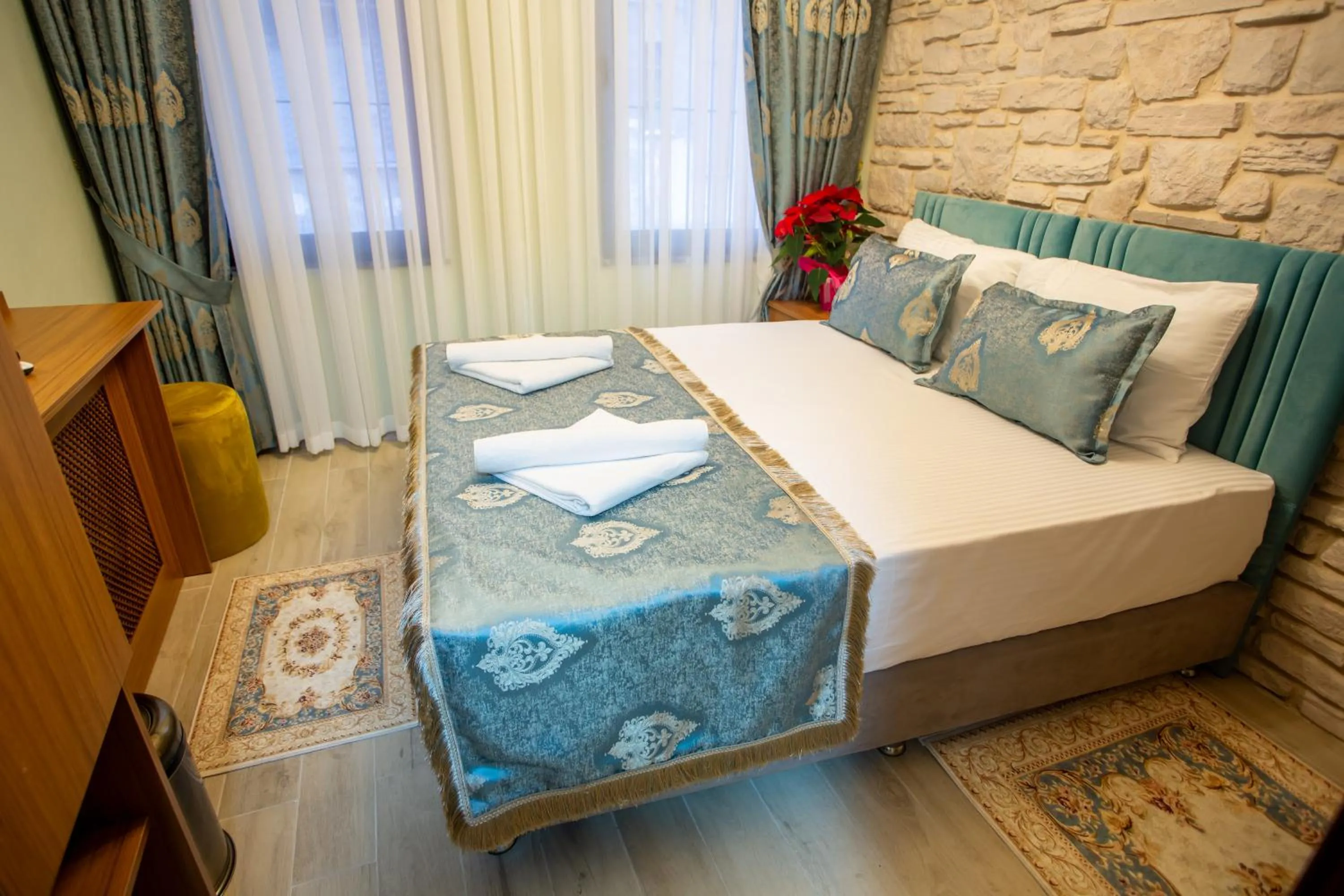 Bed in Sayina Hotel
