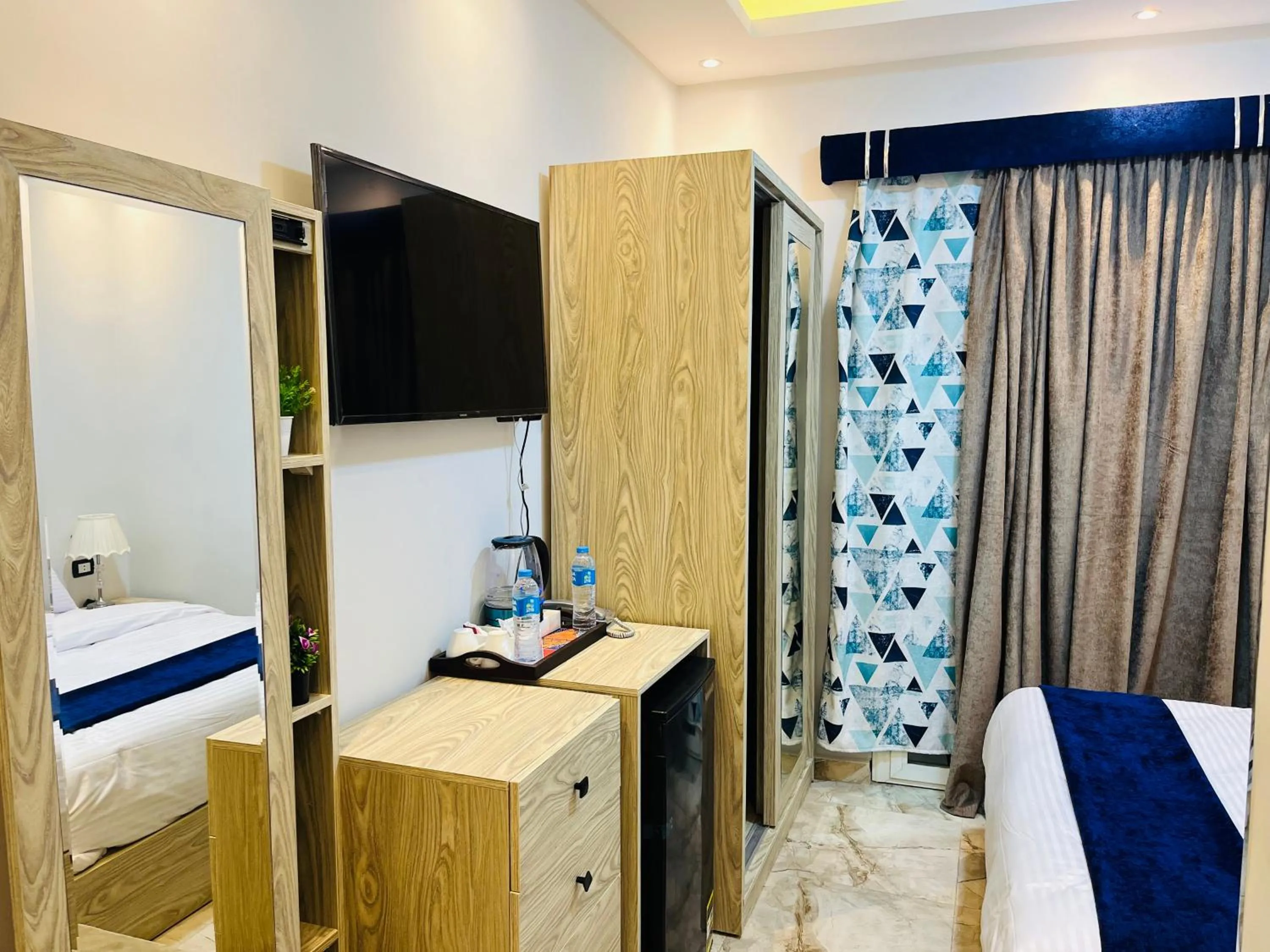 TV and multimedia, Bed in Capital Of Pyramids Hotel