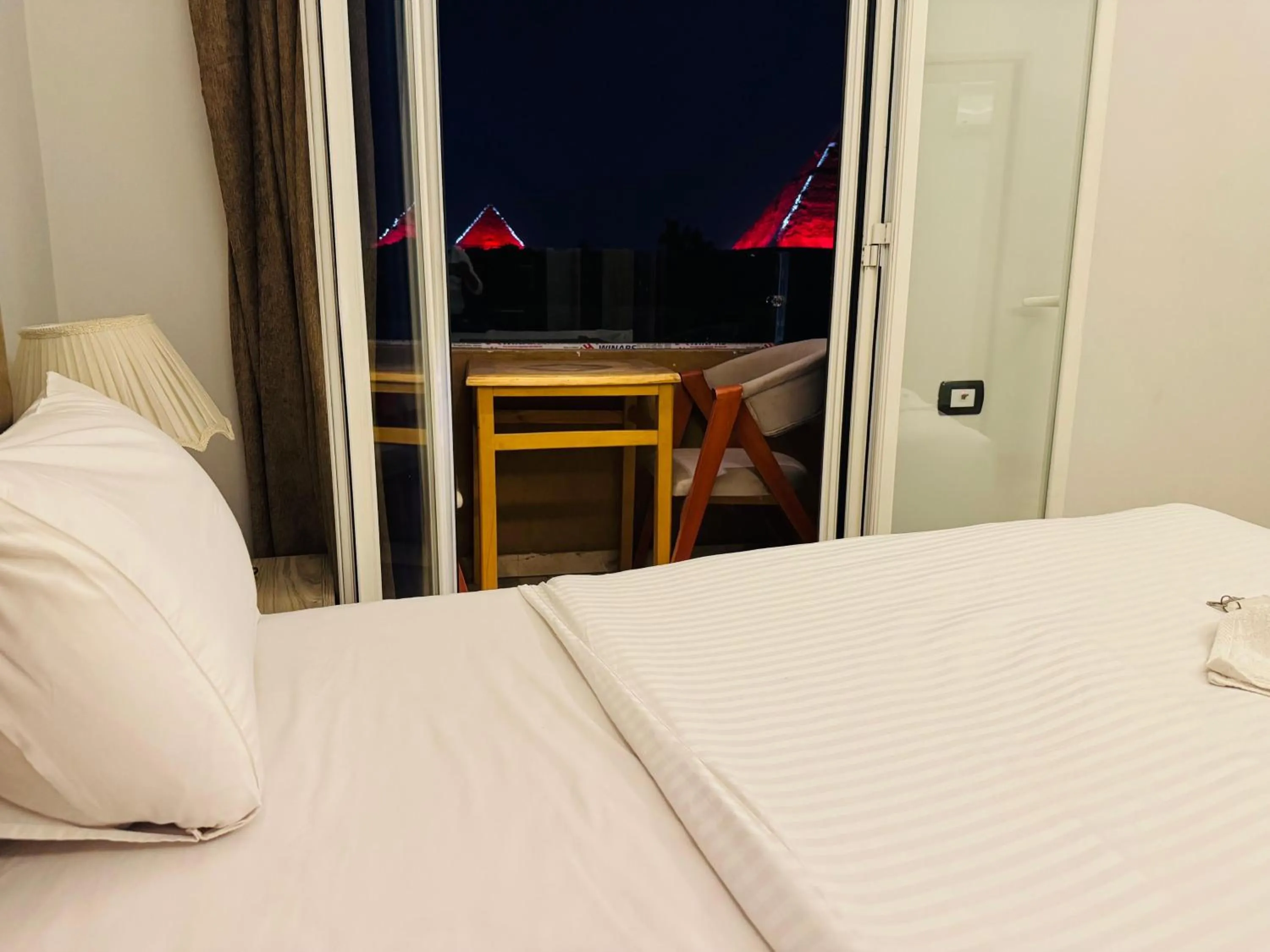 Nearby landmark, Bed in Capital Of Pyramids Hotel