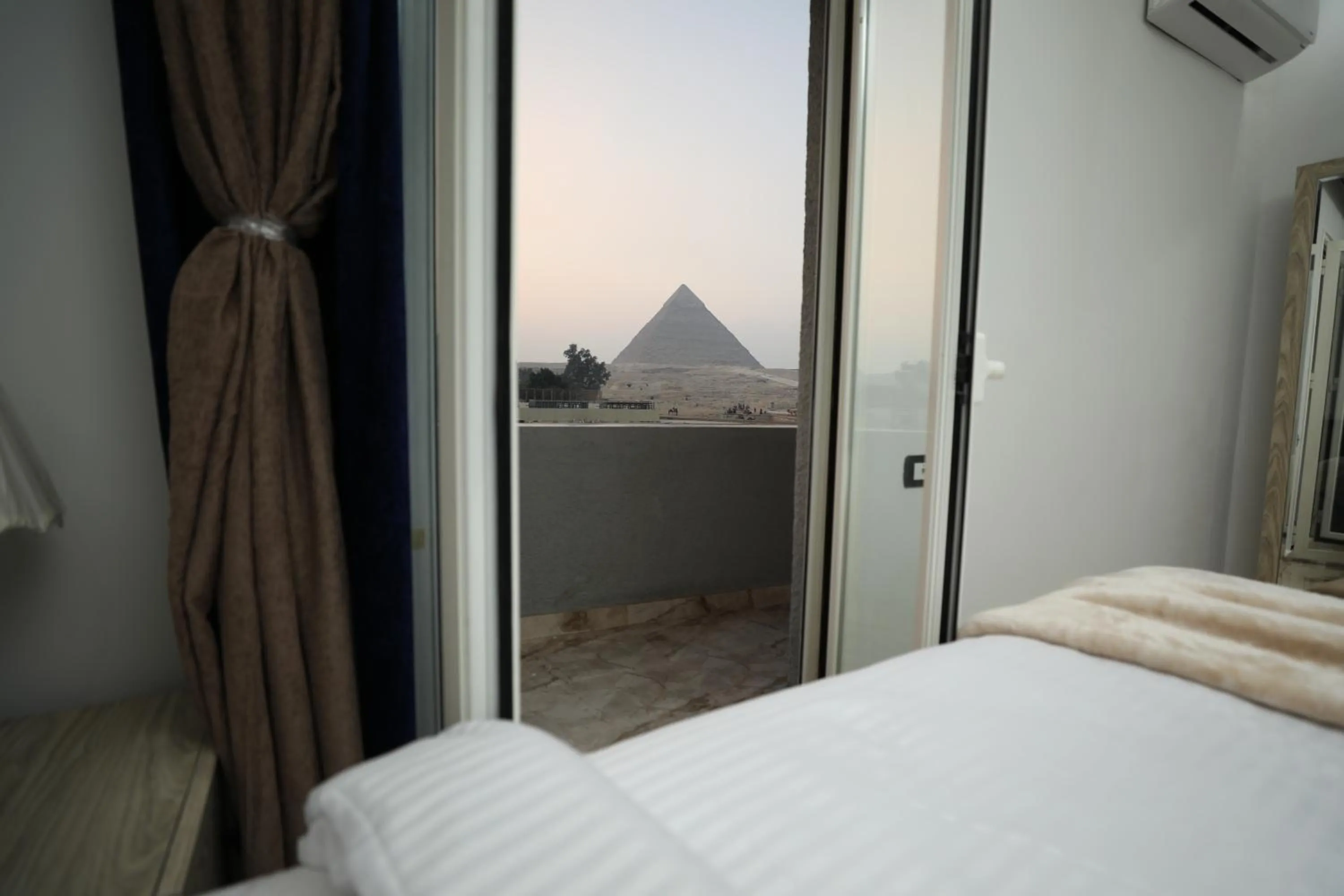 Bed in Capital Of Pyramids Hotel