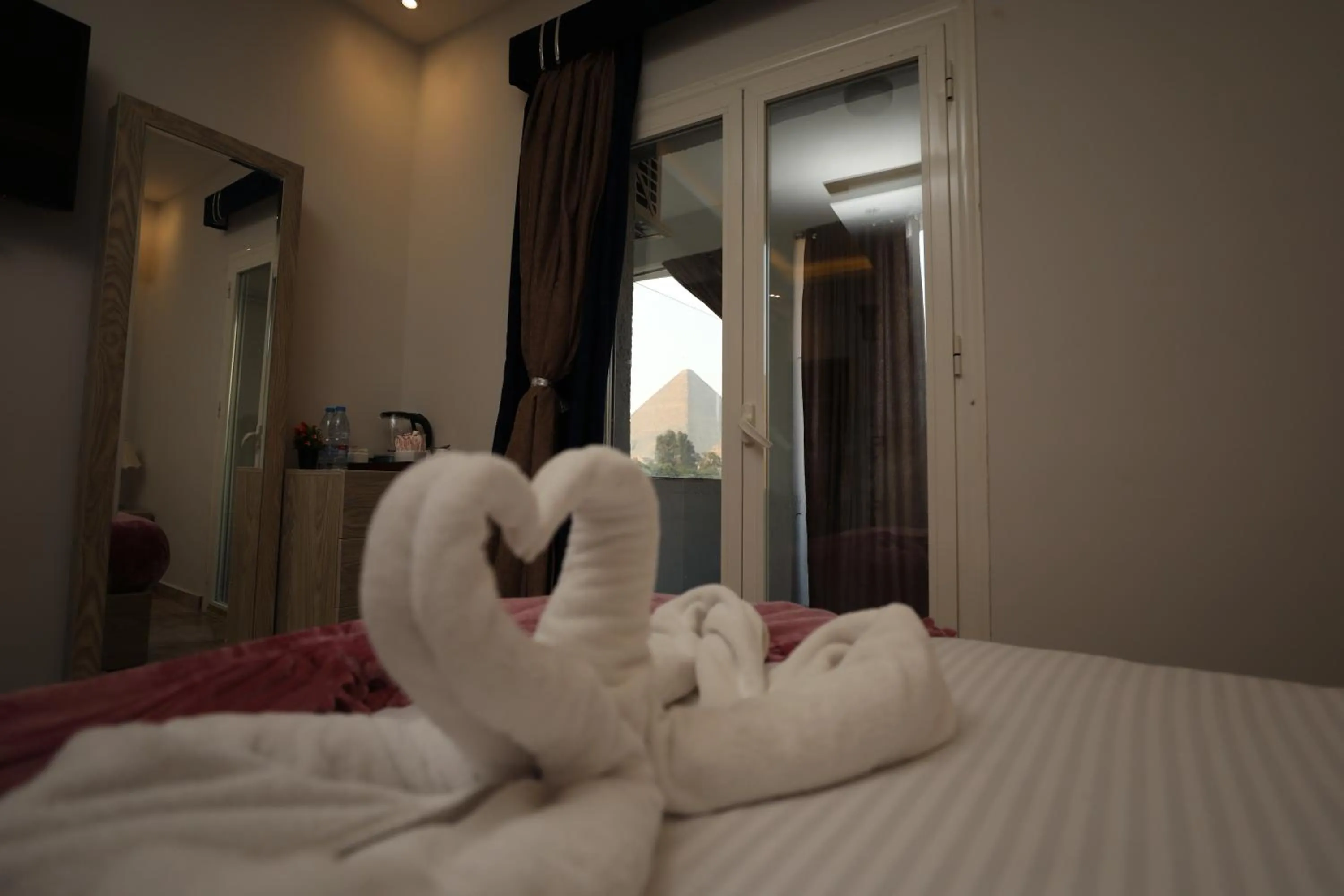 View (from property/room), Bed in Capital Of Pyramids Hotel