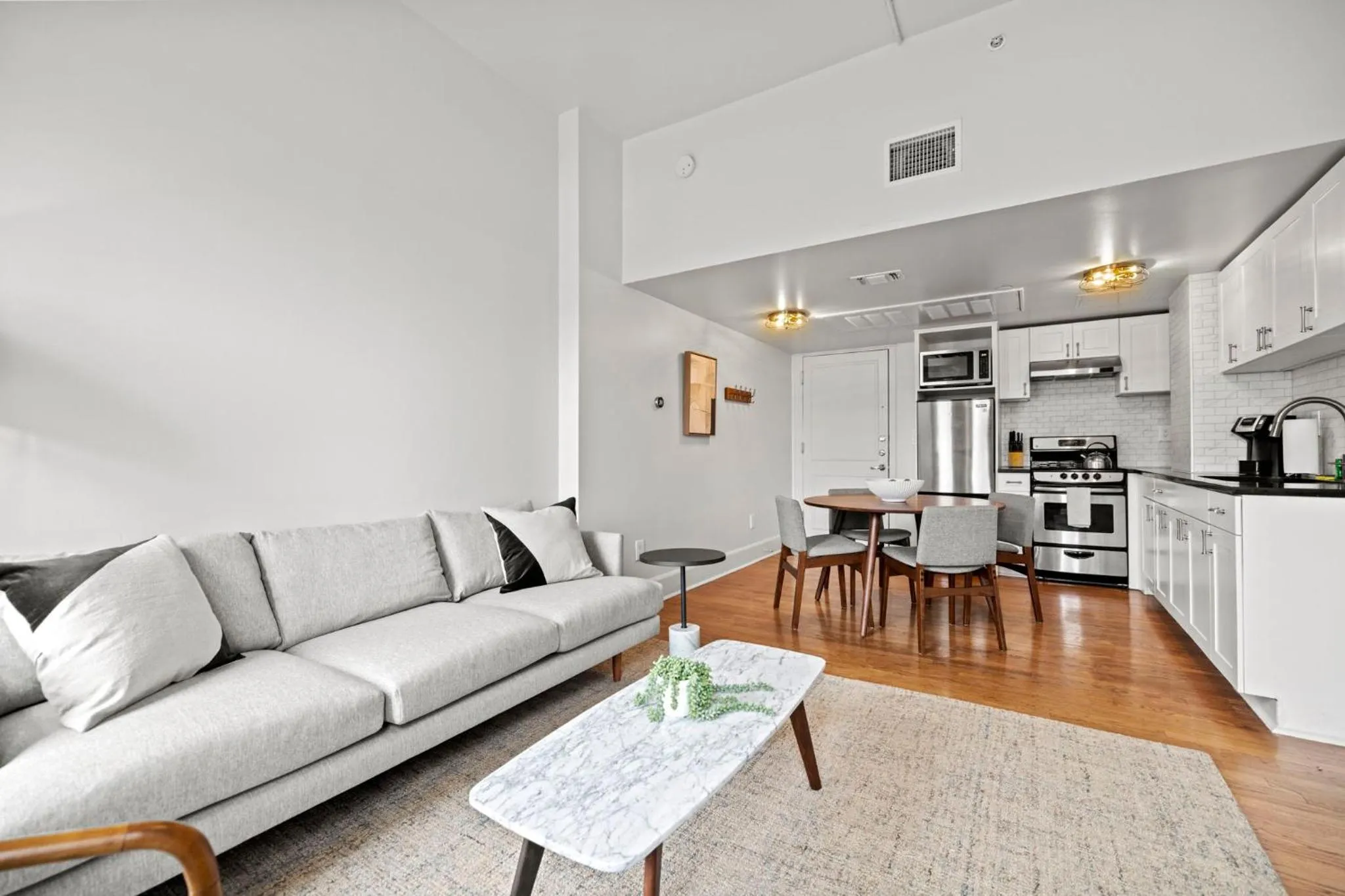 Living room in The Maverick, powered by Placemakr - River Walk