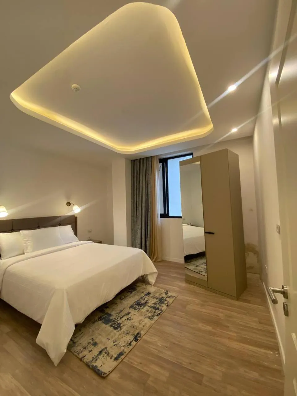 Bed in Zemilo Hotel Apartment