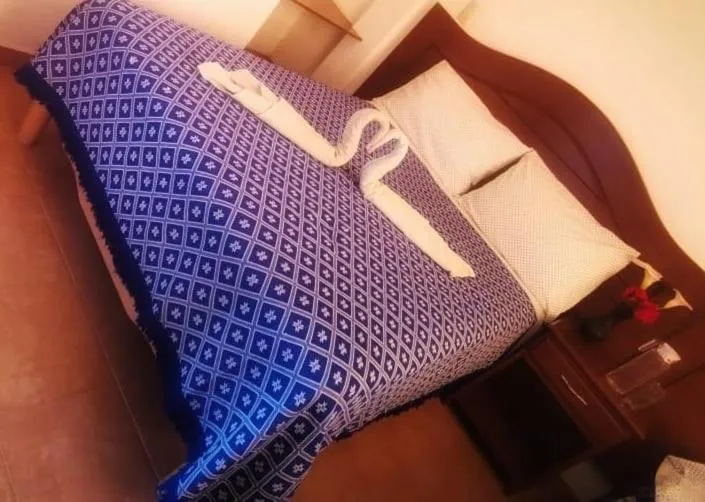 Bed in hotel posada los dominicos