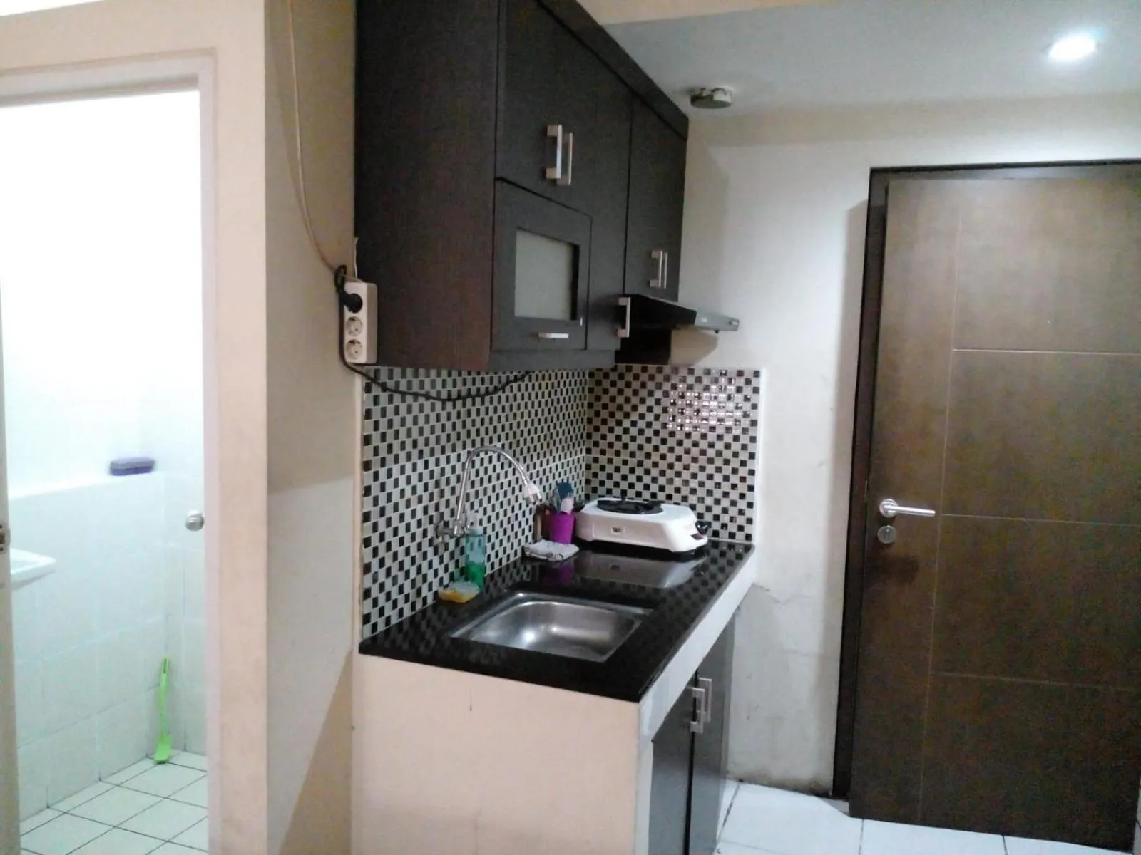 Kitchen or kitchenette in GREENROOM Apartemen Bogor Valley