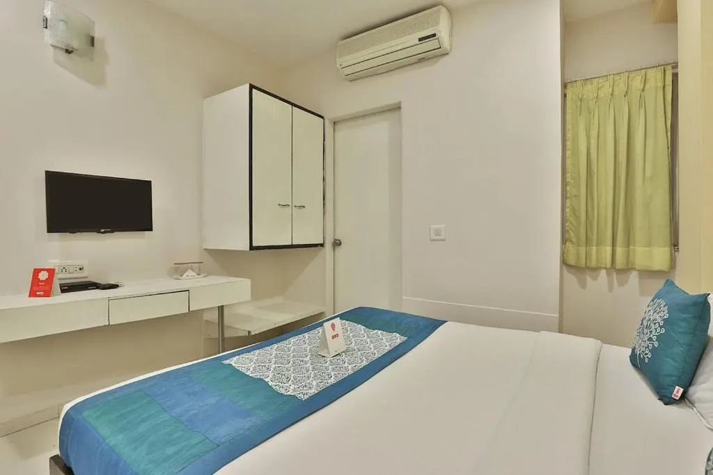 Bed in Hotel Isher International