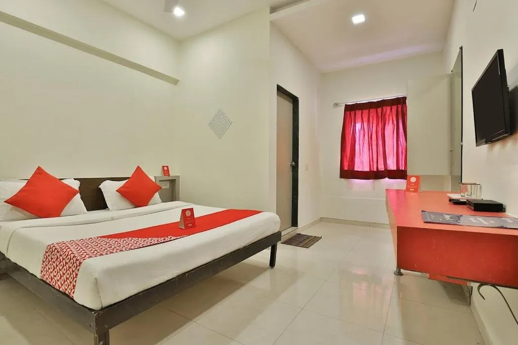 Bed in Hotel Isher International