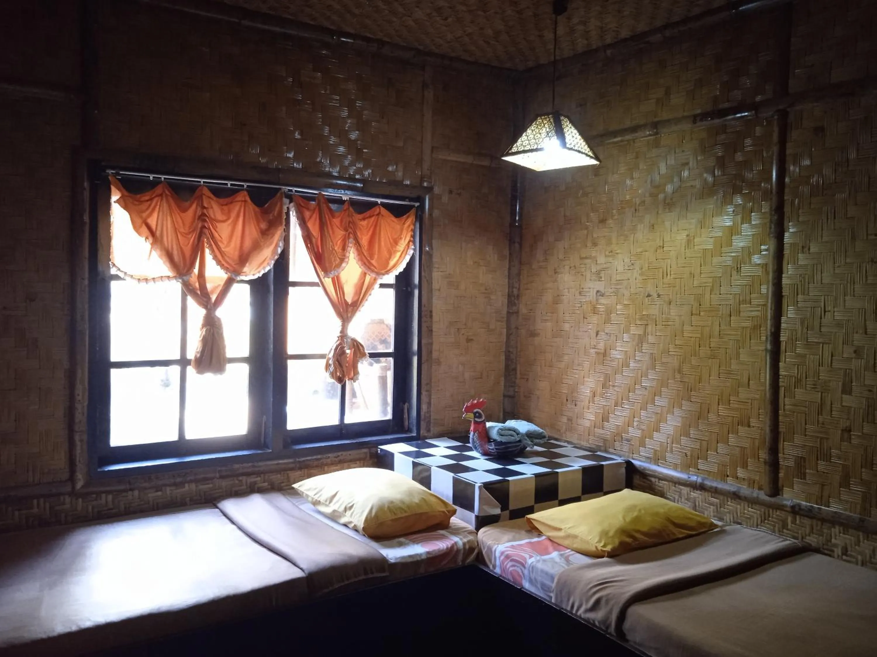 Bed in Yoschi's Hotel Bromo