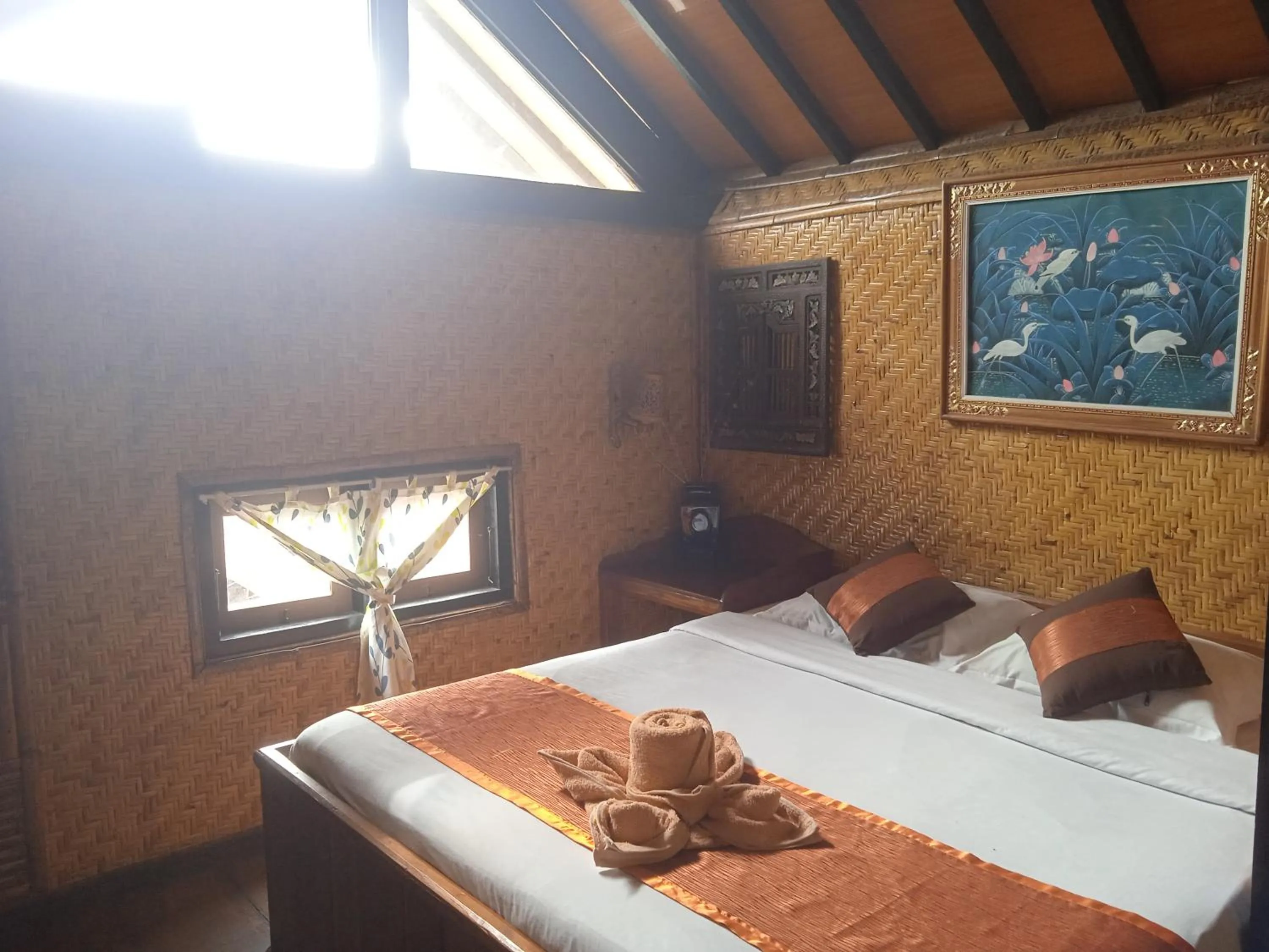 Bed in Yoschi's Hotel Bromo