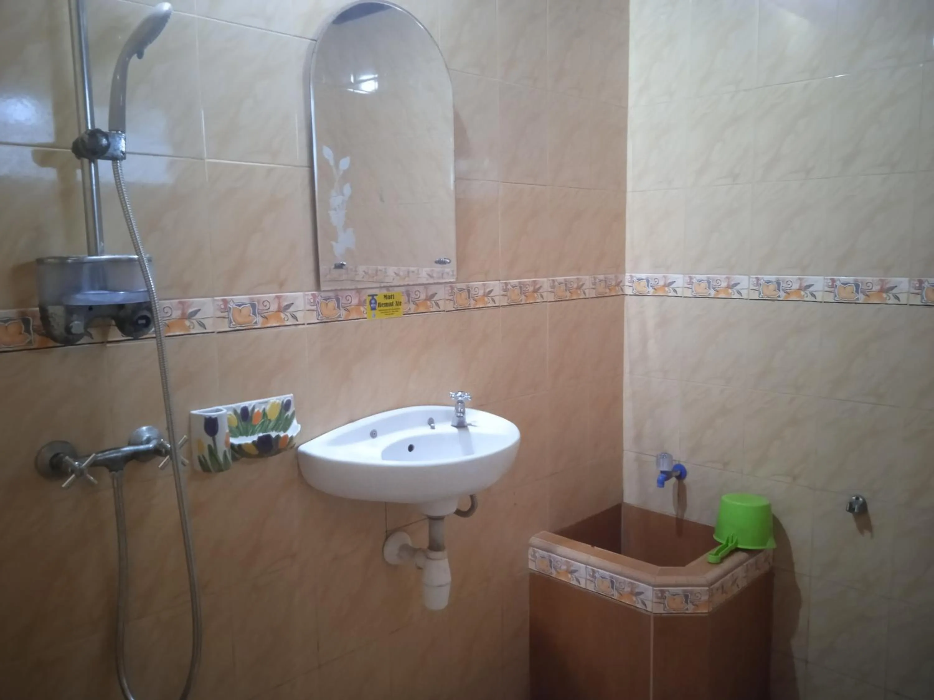 Shower in Yoschi's Hotel Bromo