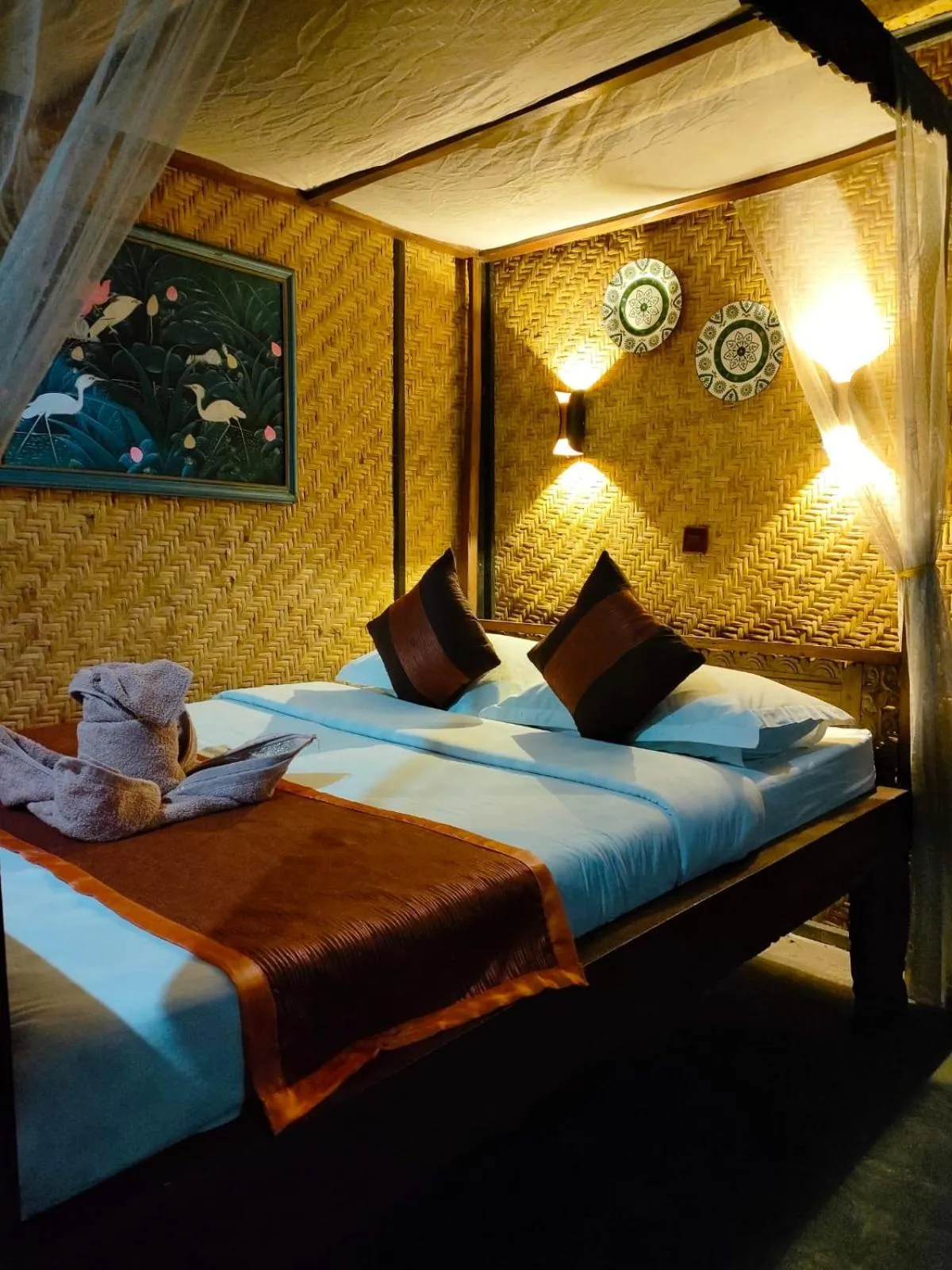 Bed in Yoschi's Hotel Bromo