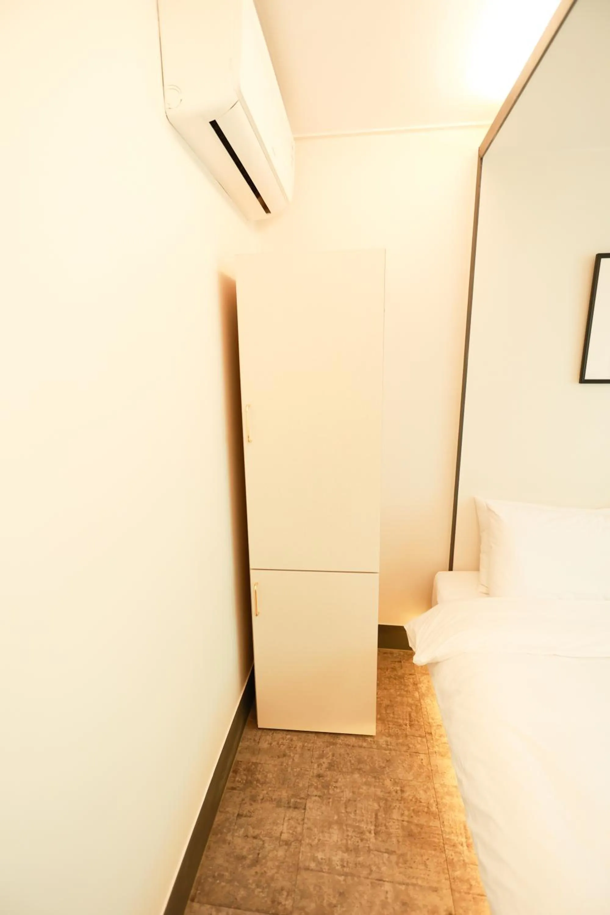 wardrobe, Bed in Hotel Myeongji