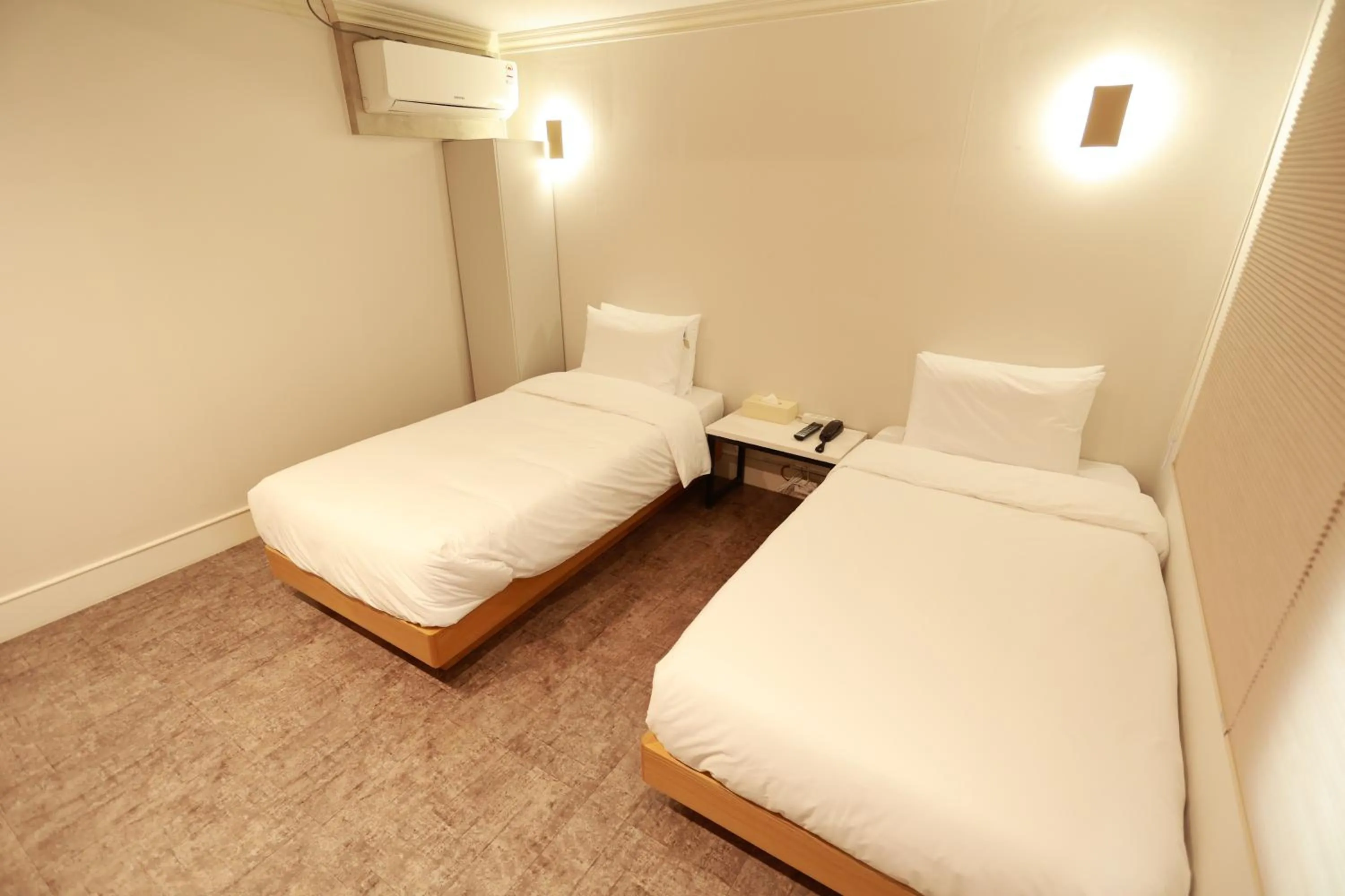 Bed in Hotel Myeongji