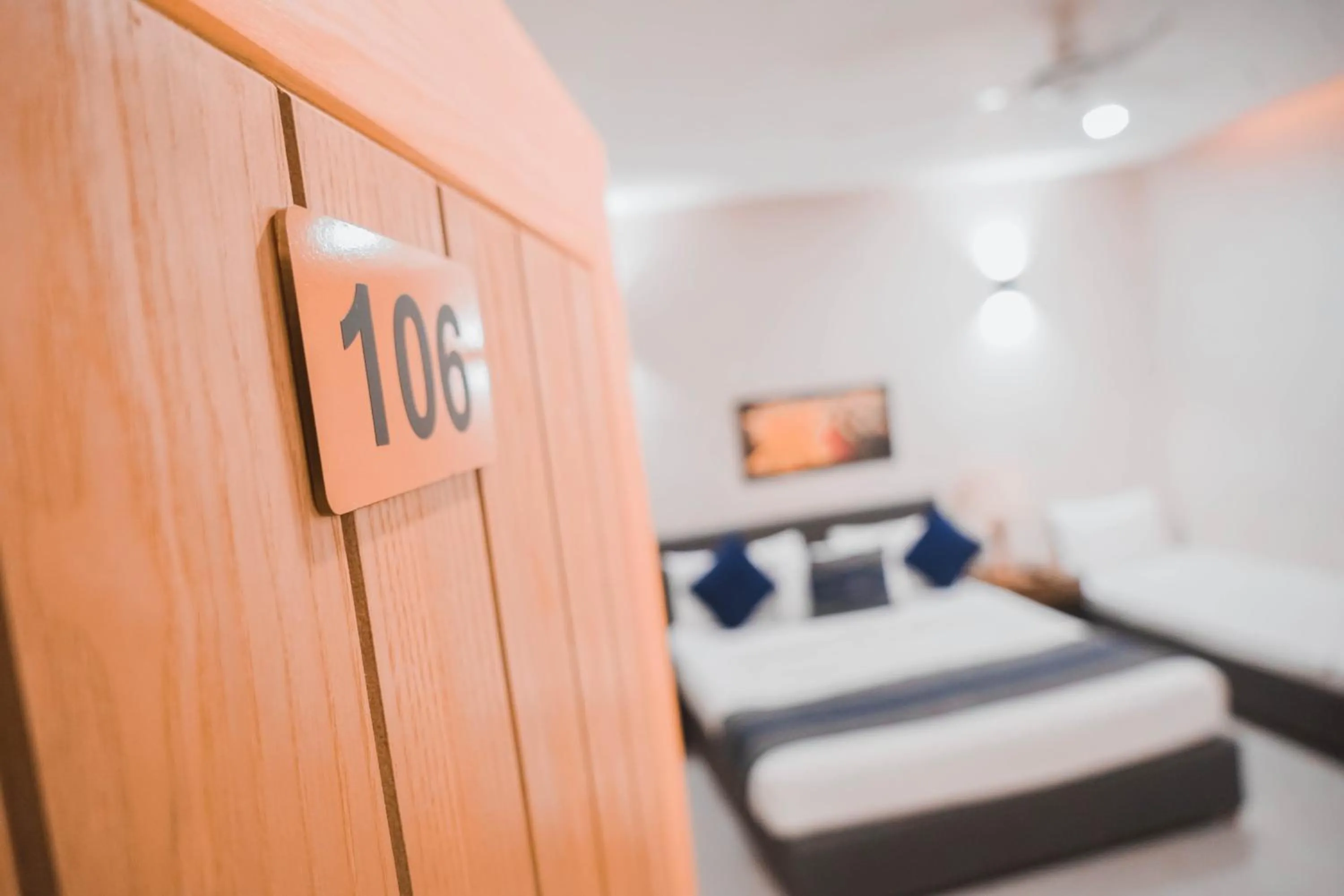 Bed in The Garden Hotel