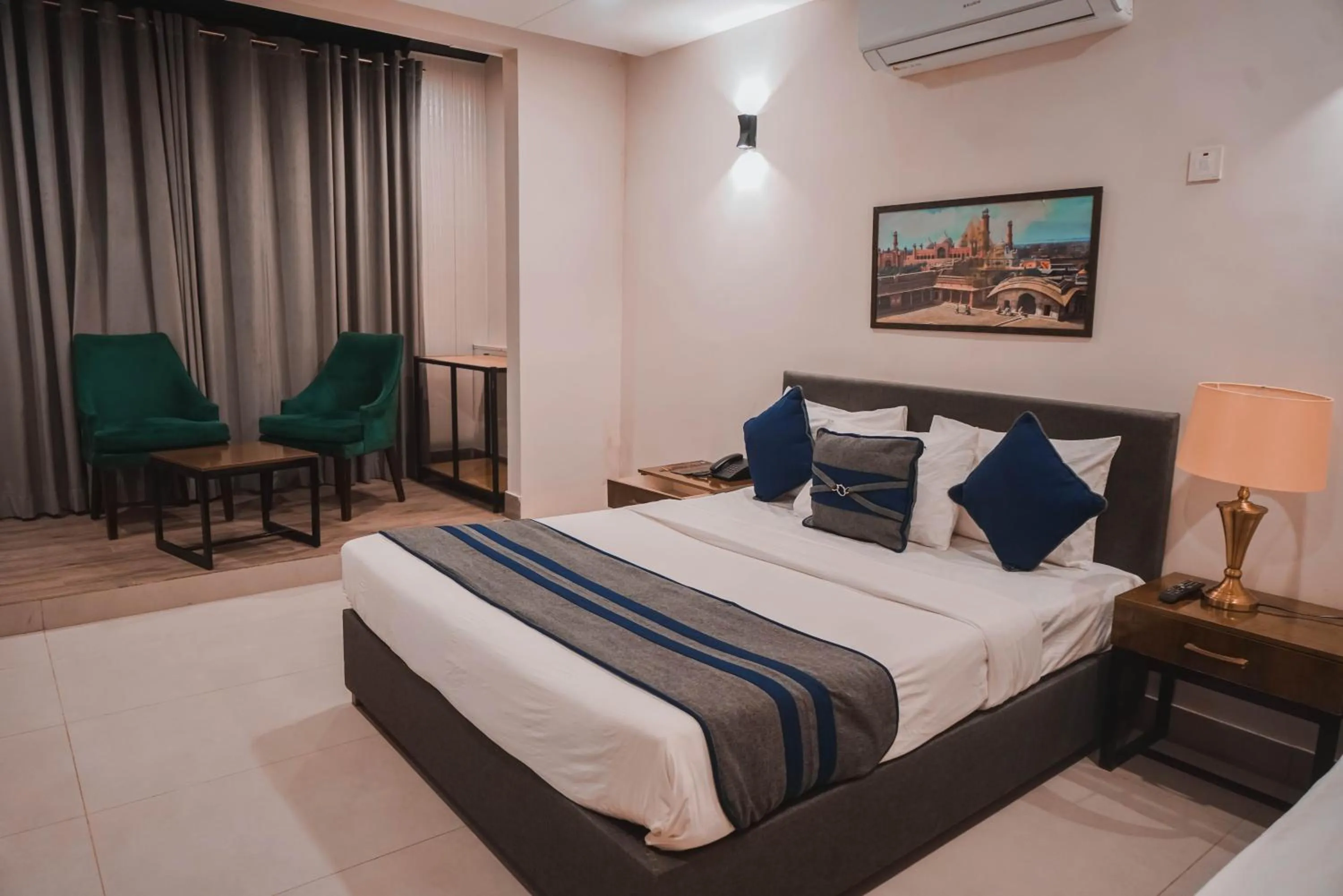 Bed in The Garden Hotel