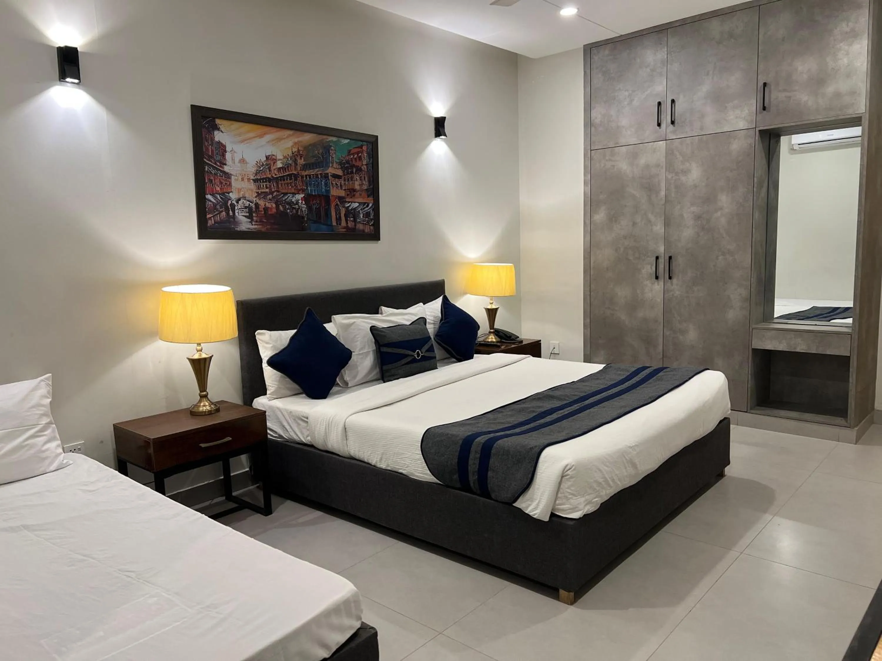 Bed in The Garden Hotel