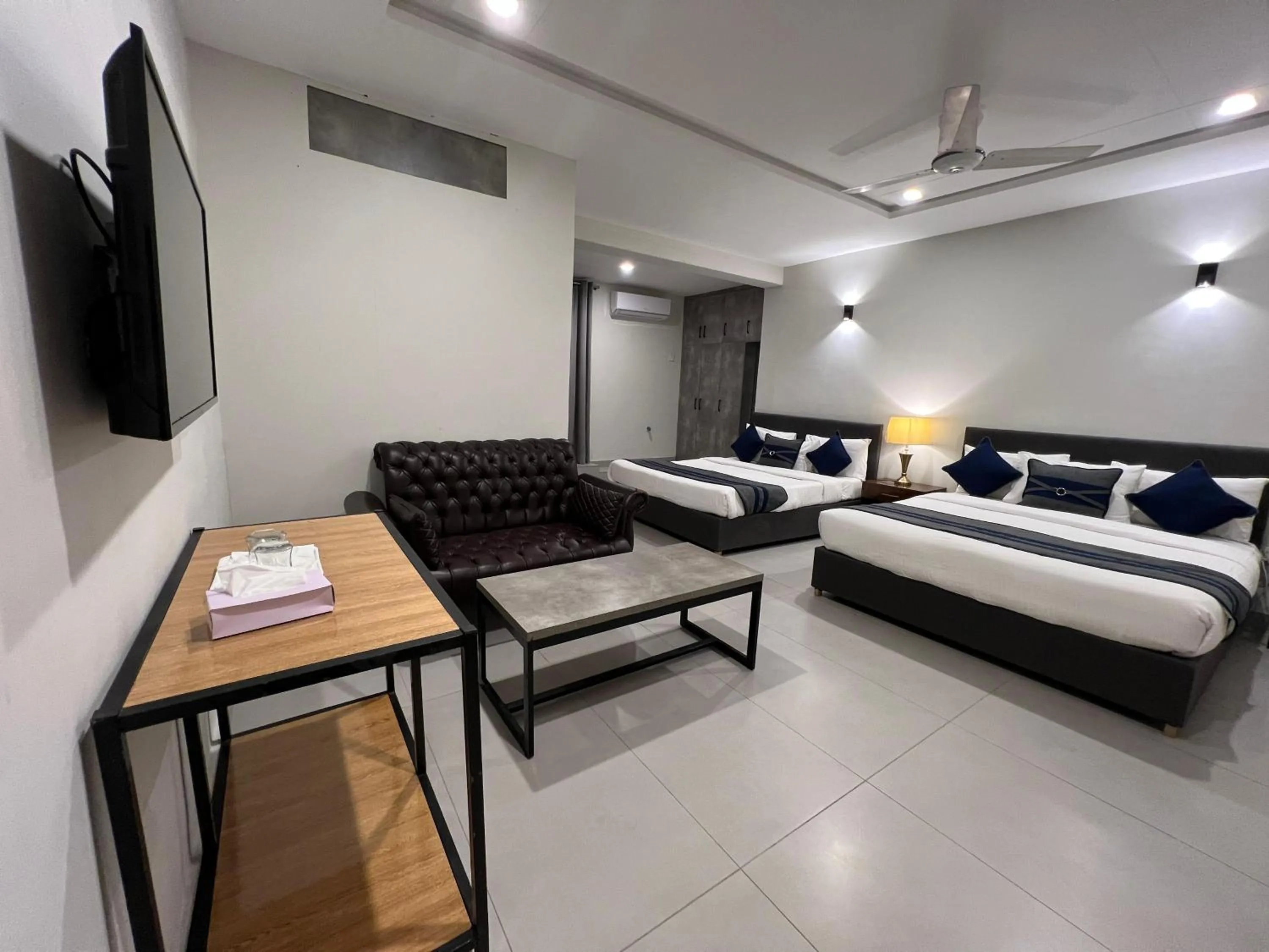 Bed in The Garden Hotel