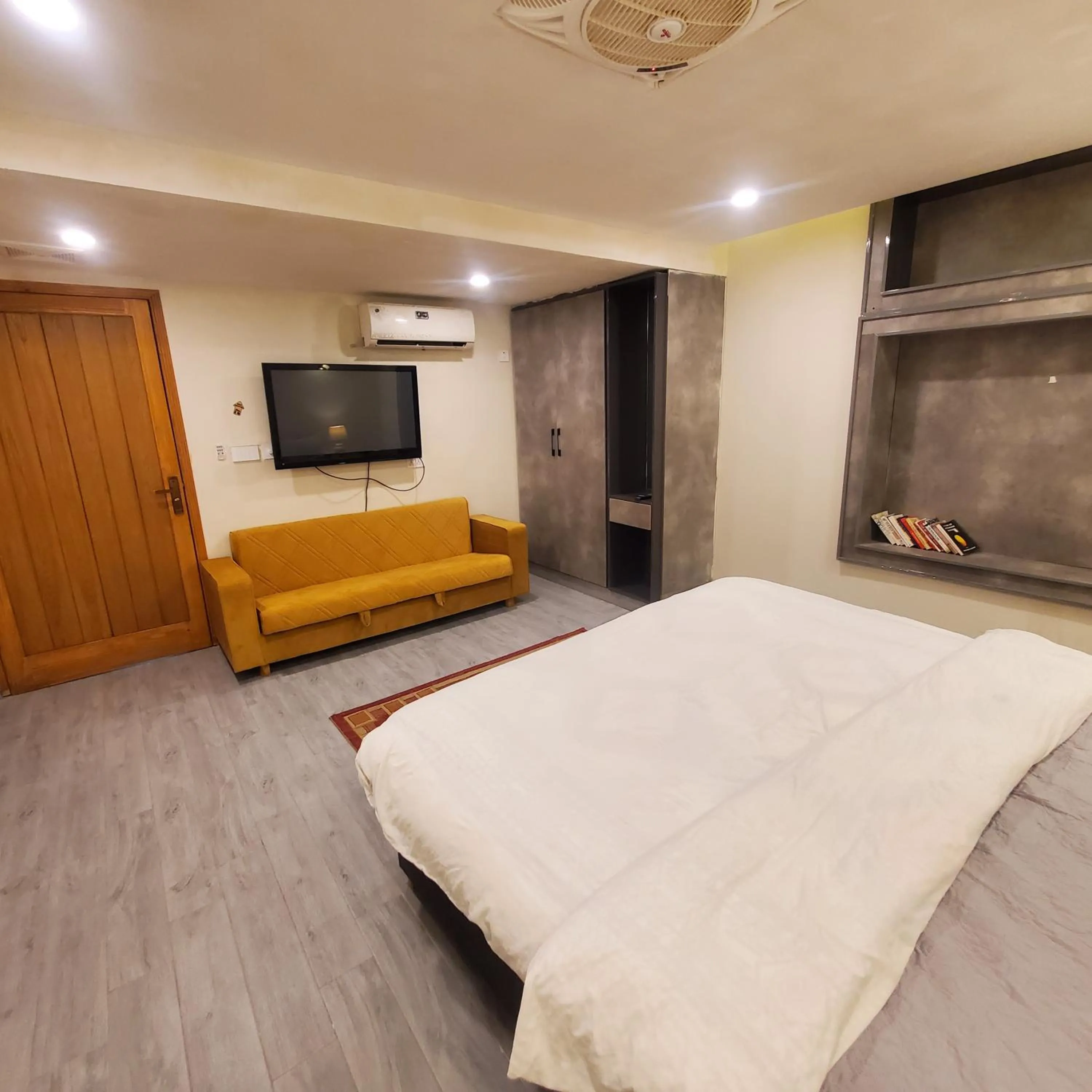 Bed in The Garden Hotel