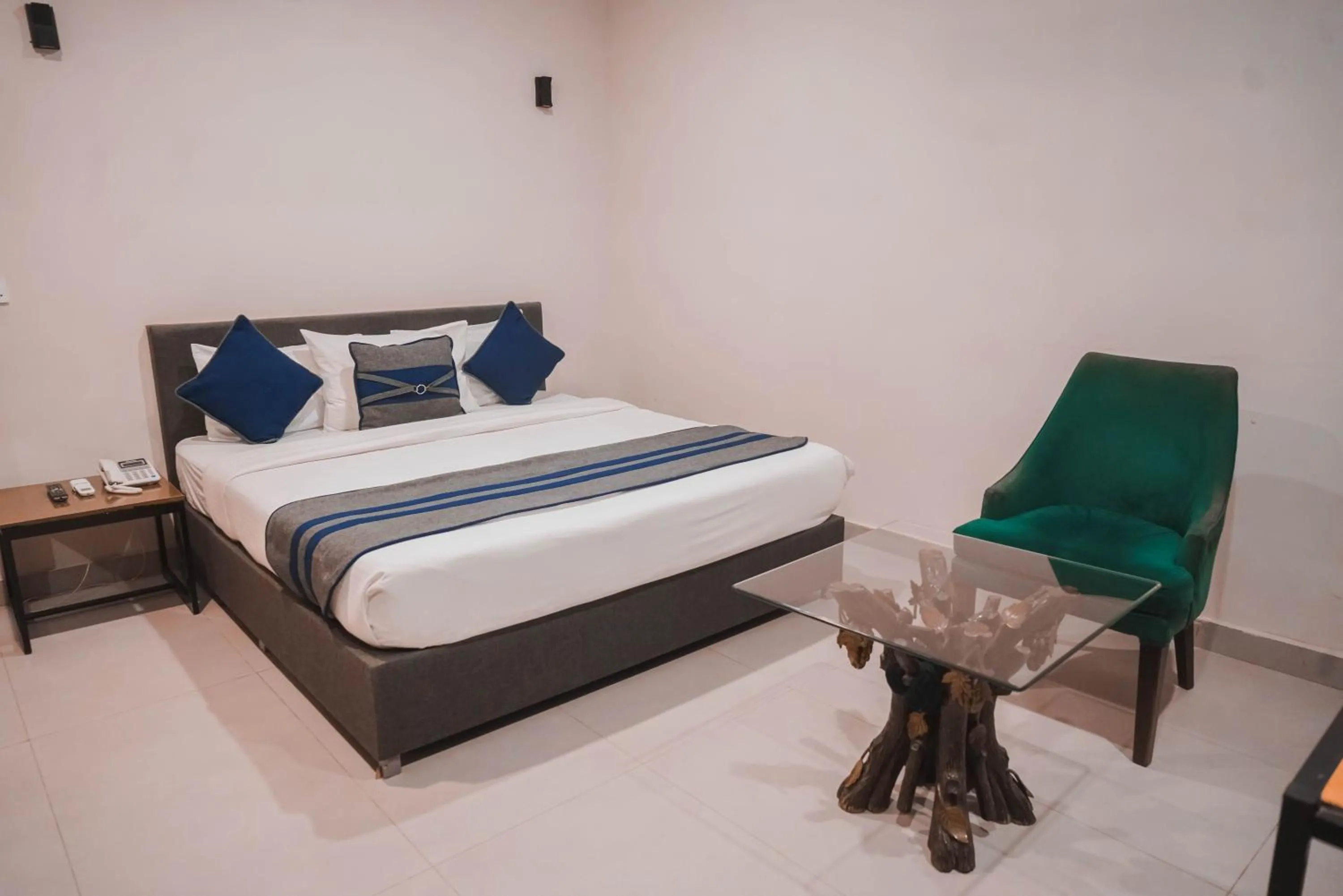 Bed in The Garden Hotel