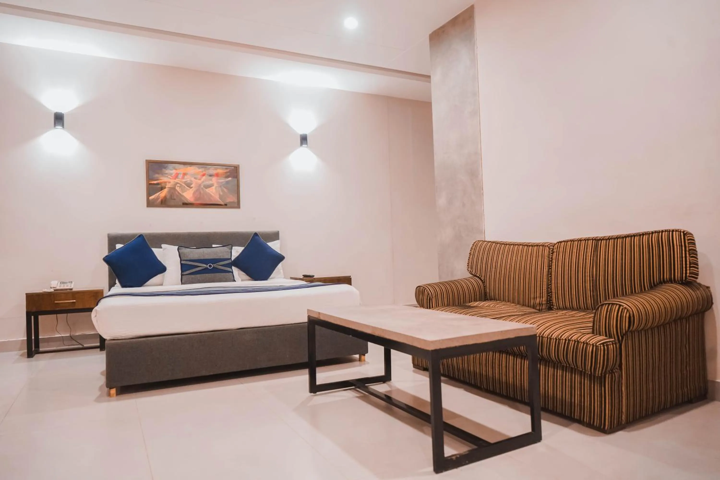 Bed in The Garden Hotel