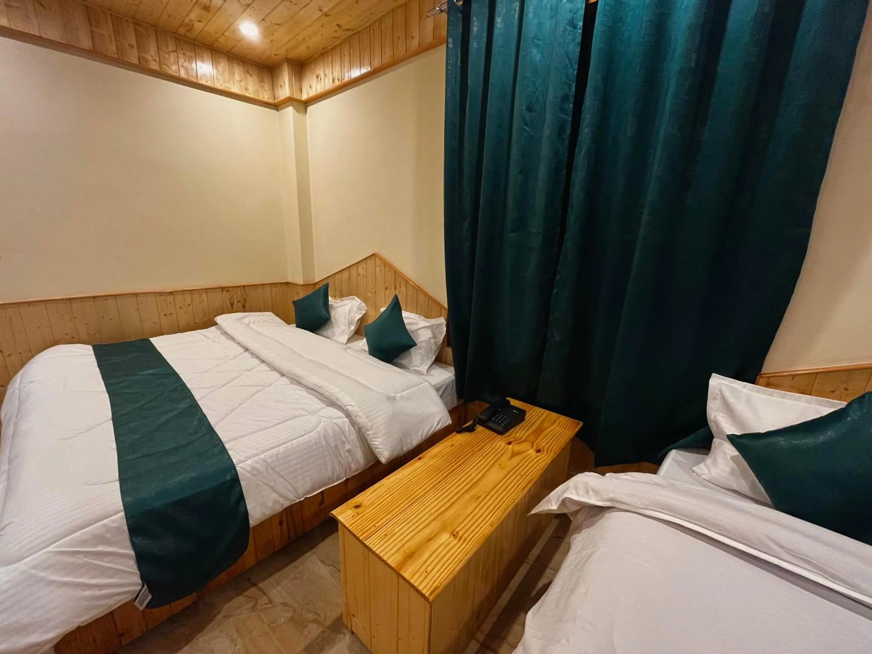 Family, Bed in Hotel Mid Orchard Kasol l River Side -Pure Veg Hotel