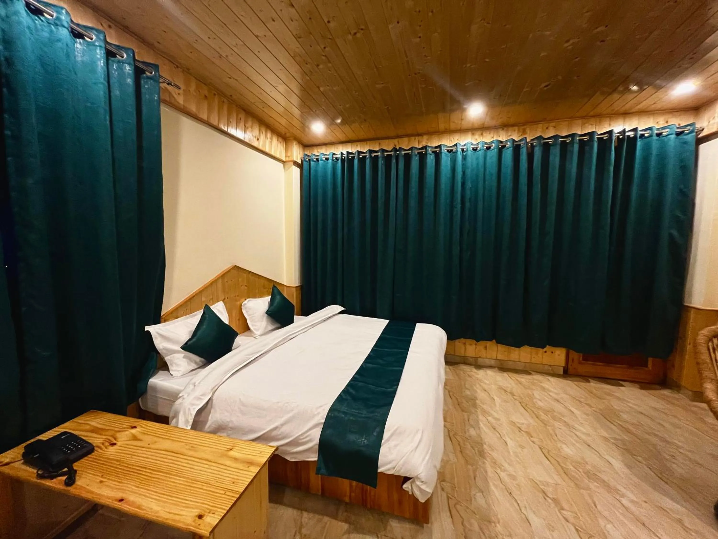 Bedroom, Bed in Hotel Mid Orchard Kasol l River Side -Pure Veg Hotel