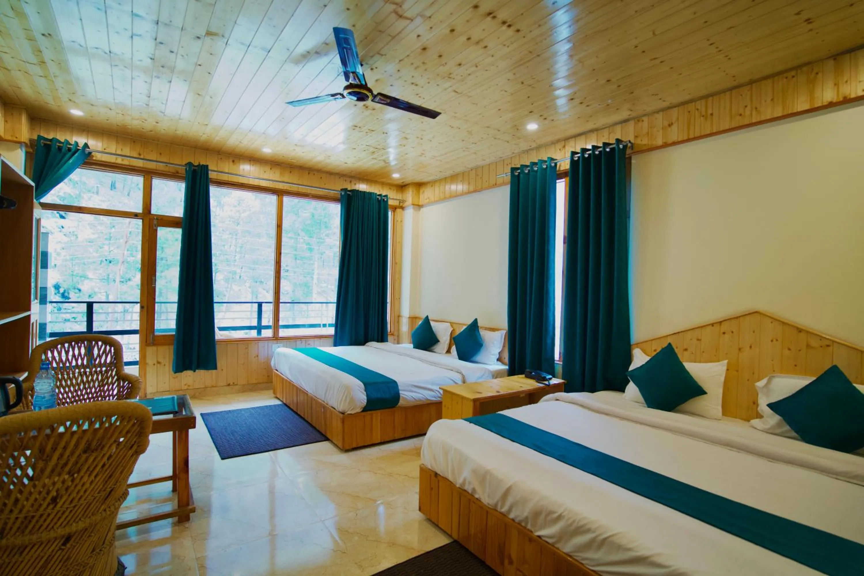 Bedroom, Bed in Hotel Mid Orchard Kasol l River Side -Pure Veg Hotel