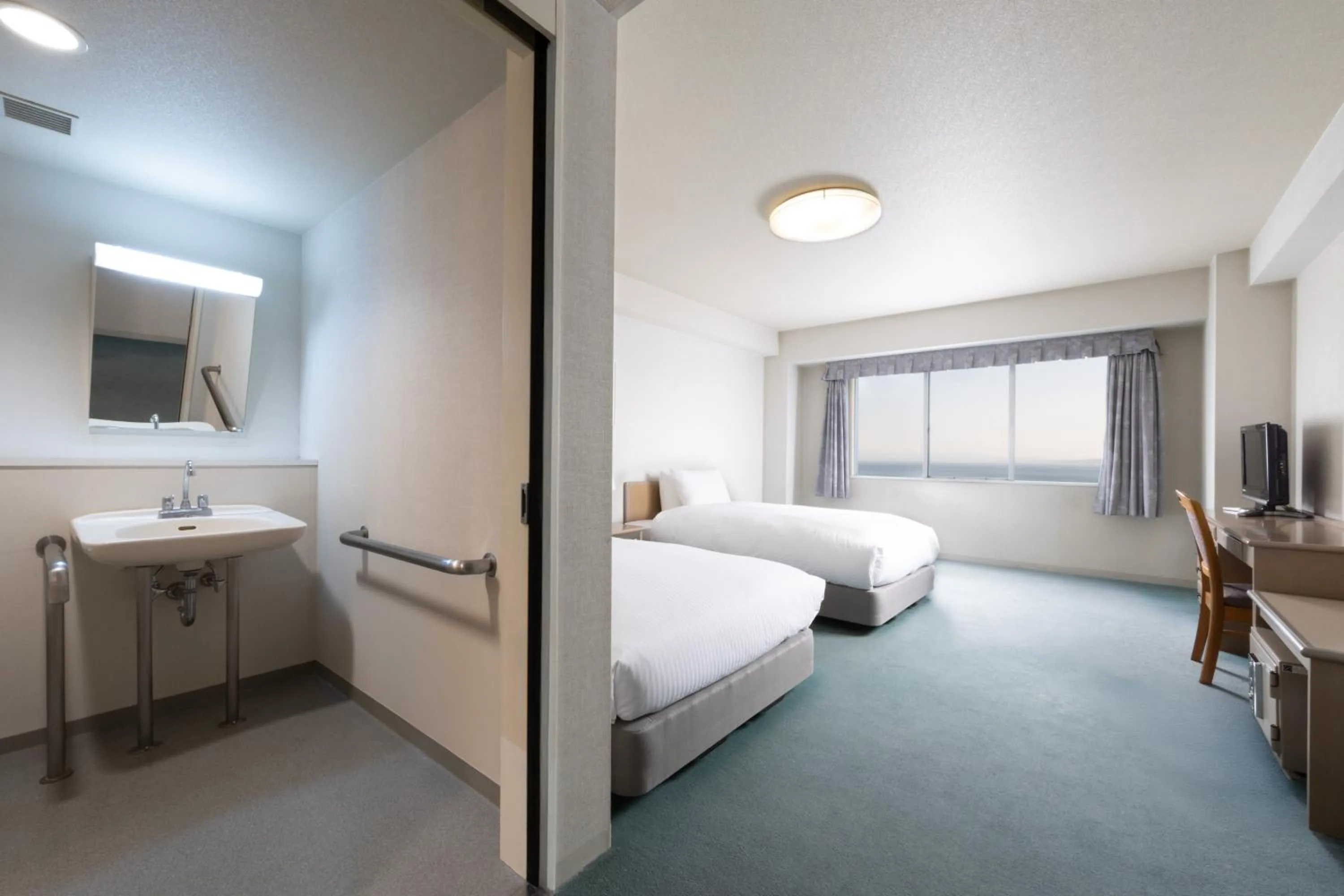 Photo of the whole room, Bed in Grand Mercure Beppu Bay Resort & Spa