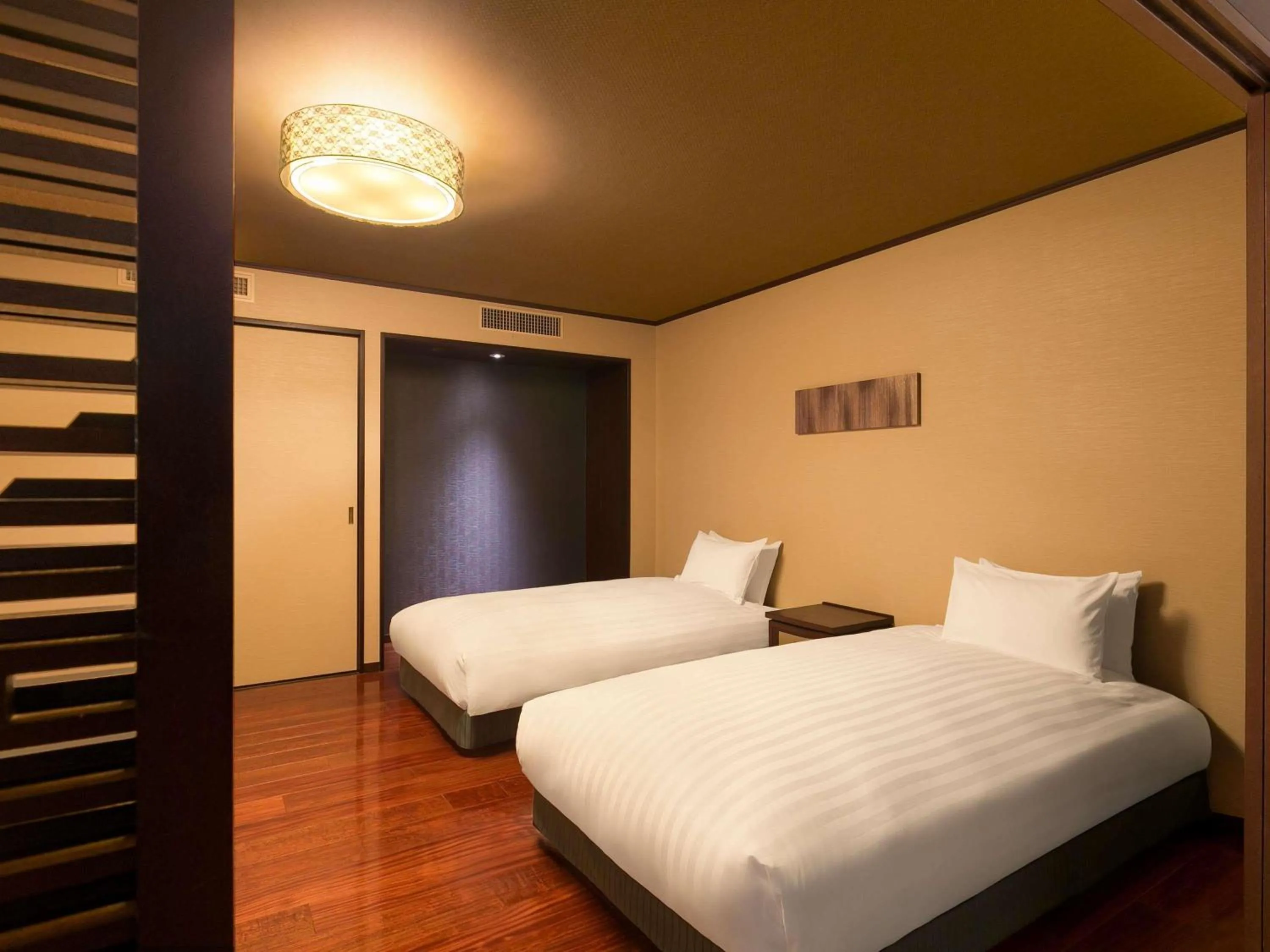 Bedroom, Bed in Grand Mercure Lake Biwa Resort & Spa