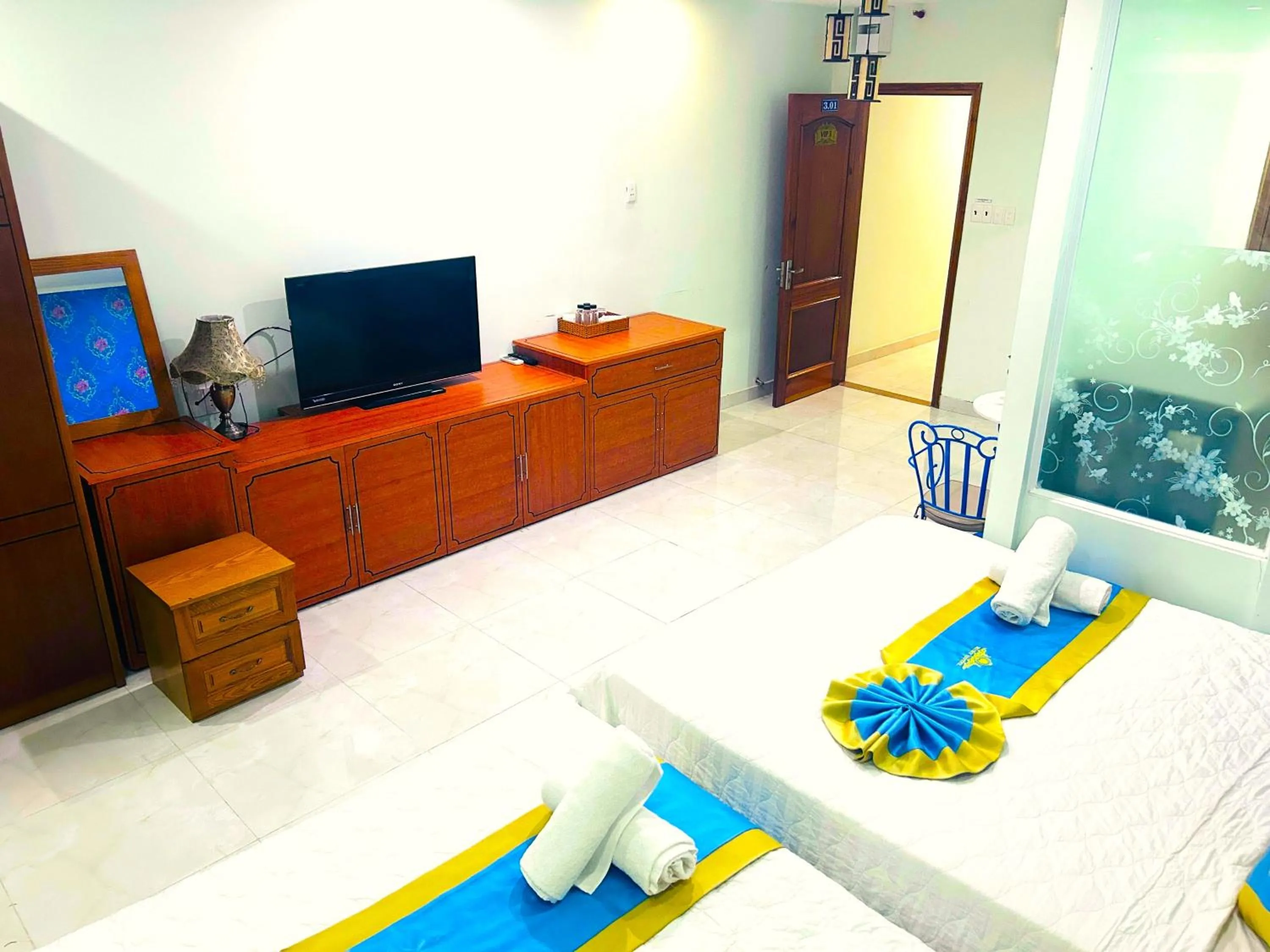 Communal lounge/ TV room, Bed in TNH Hotel Vung Tau