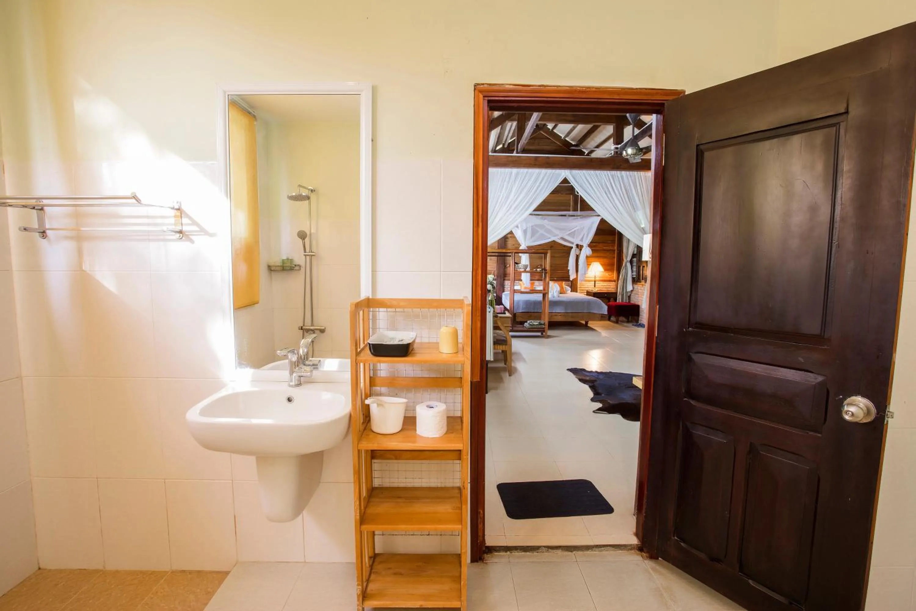 Bathroom, Bed in Cat Tien Jungle Lodge