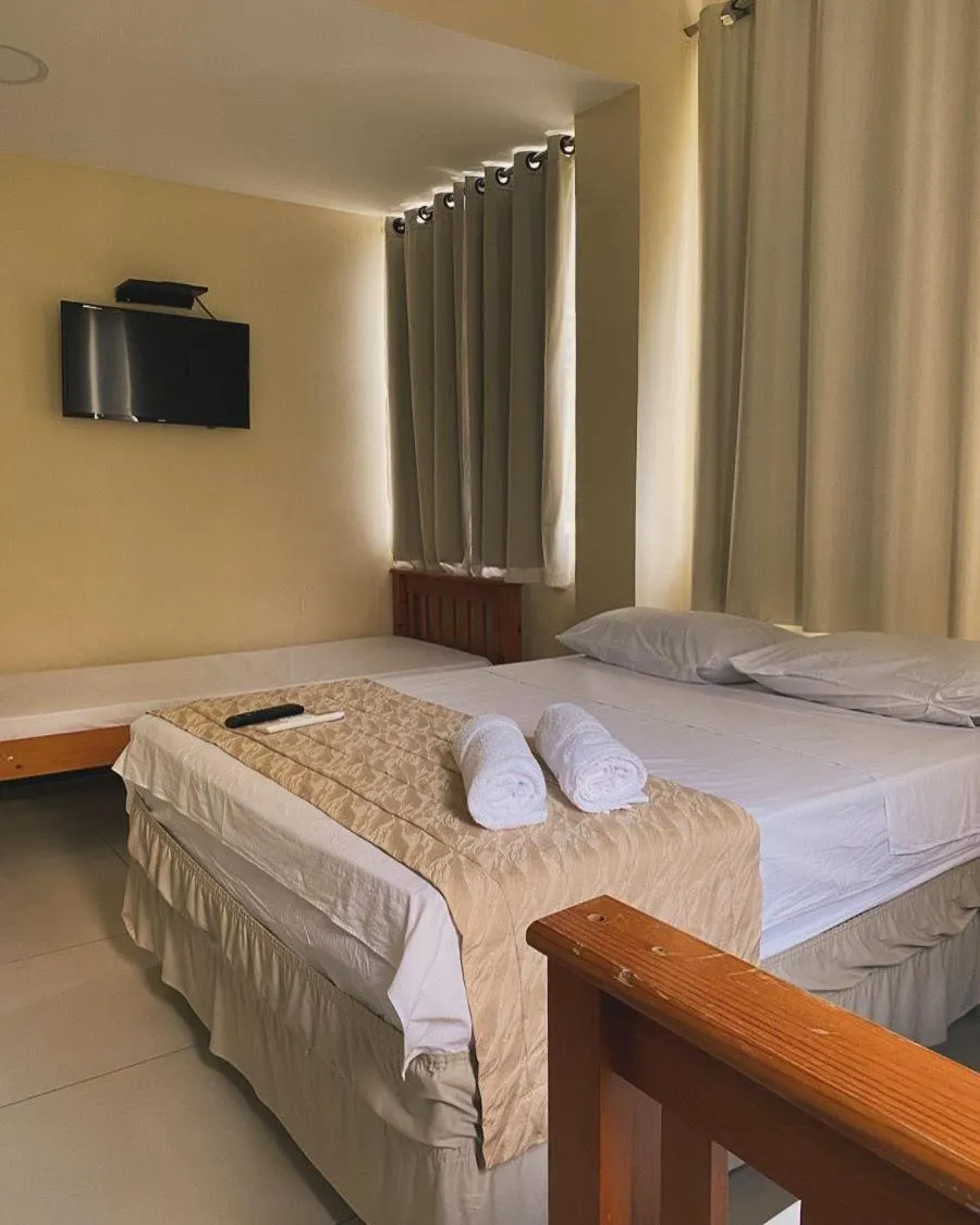 Bed in Alfinin Hotel de Praia