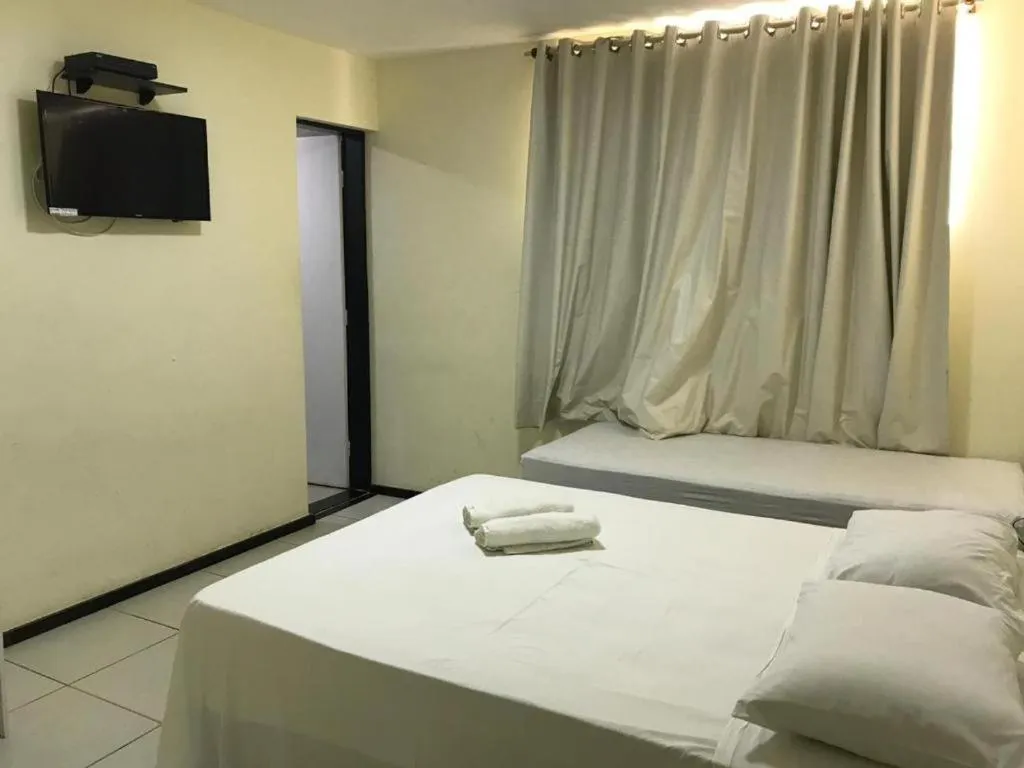 Bed in Alfinin Hotel de Praia