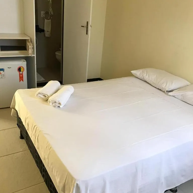 Bed in Alfinin Hotel de Praia