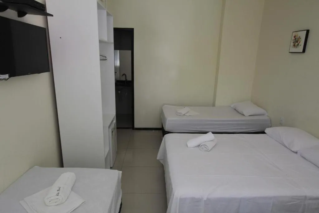 Bed in Alfinin Hotel de Praia