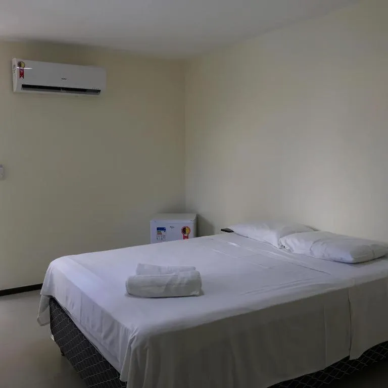 Bed in Alfinin Hotel de Praia