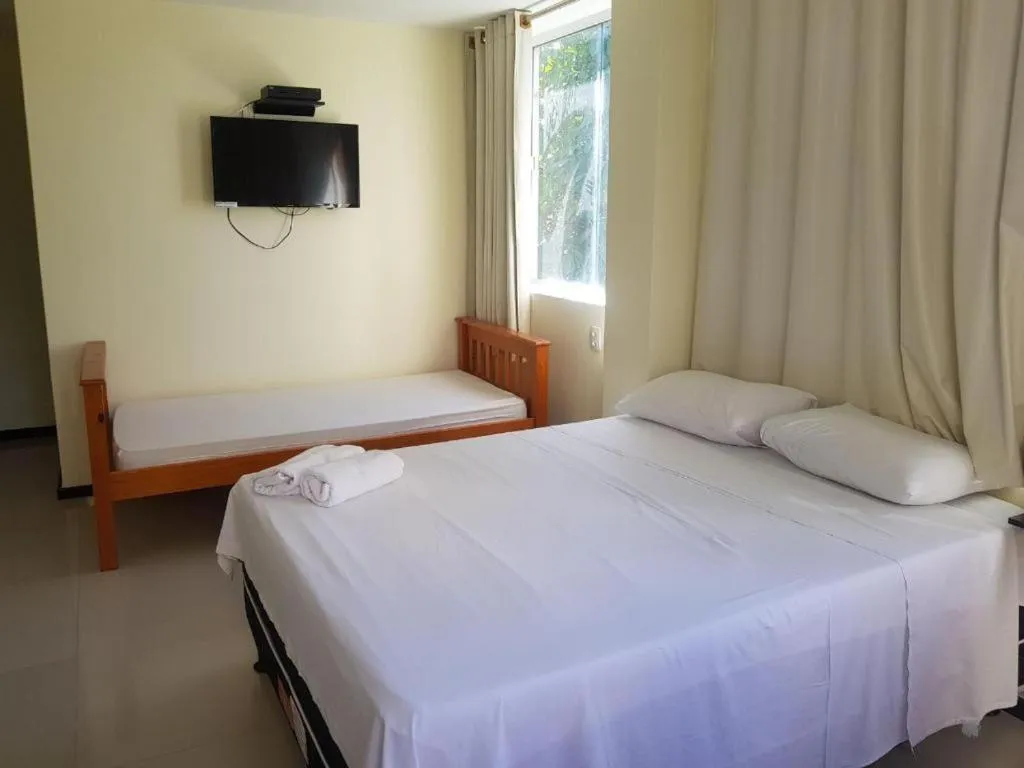 Bed in Alfinin Hotel de Praia