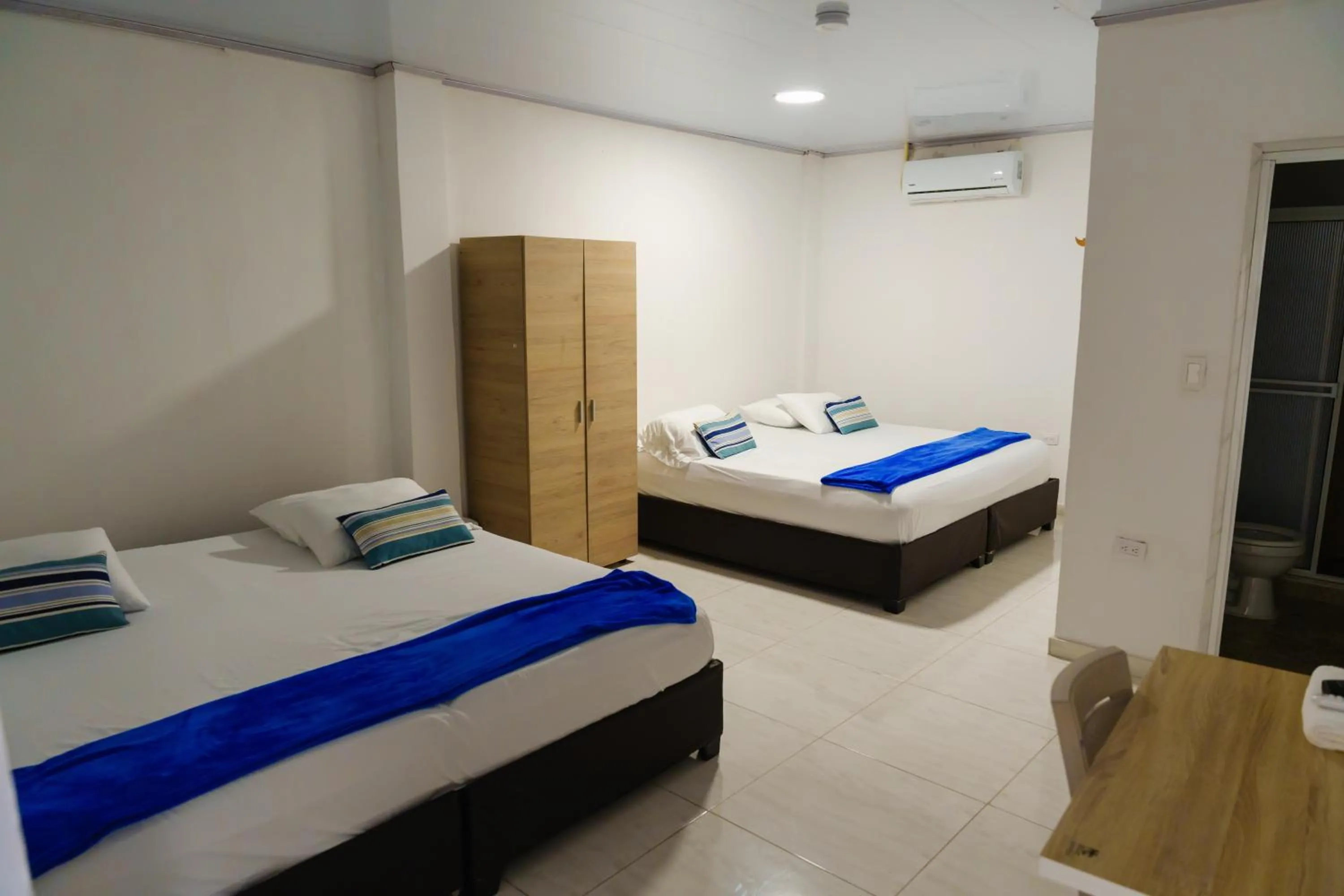 Photo of the whole room, Bed in Edificio Regata INN