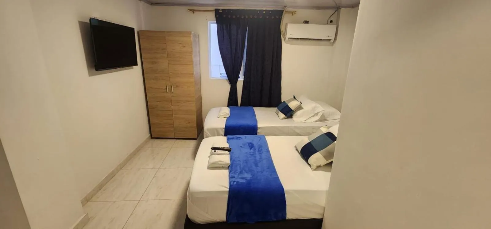 Photo of the whole room, Bed in Edificio Regata INN