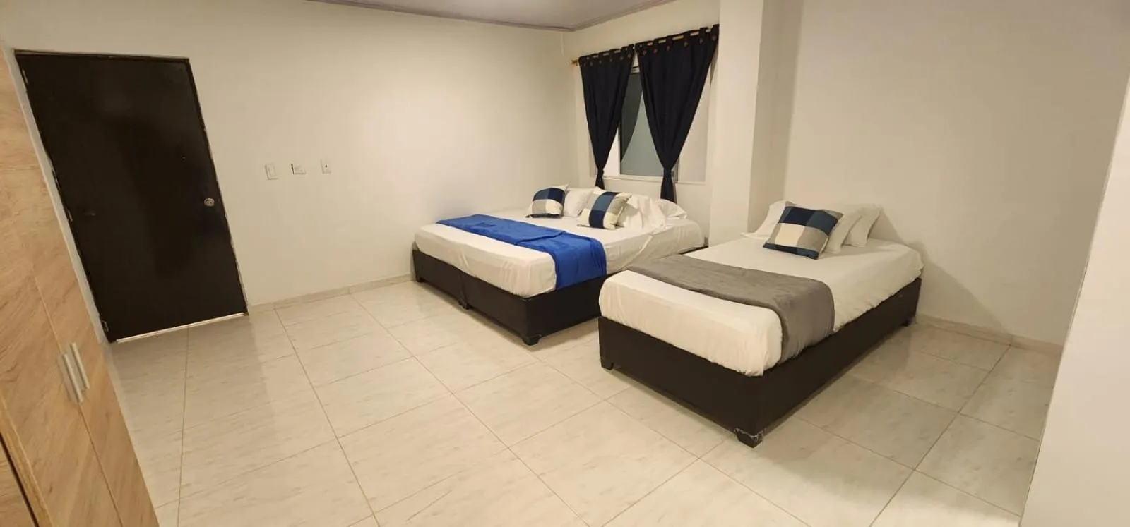 Photo of the whole room, Bed in Edificio Regata INN