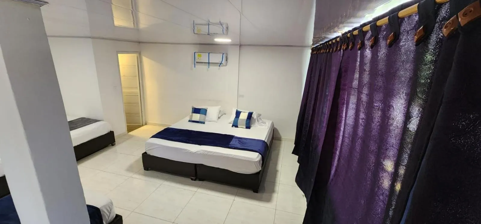 Photo of the whole room, Bed in Edificio Regata INN