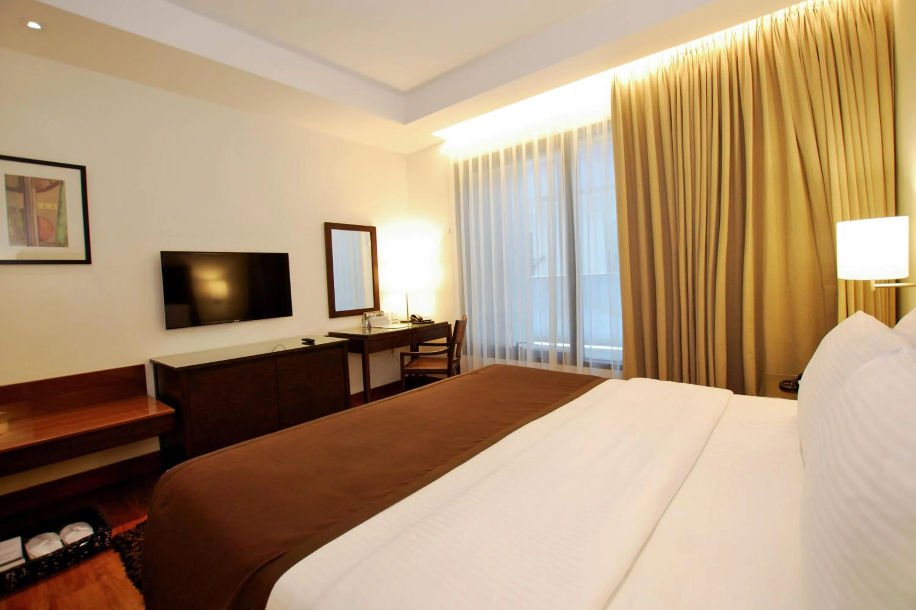 Bed in City Garden Grand Hotel