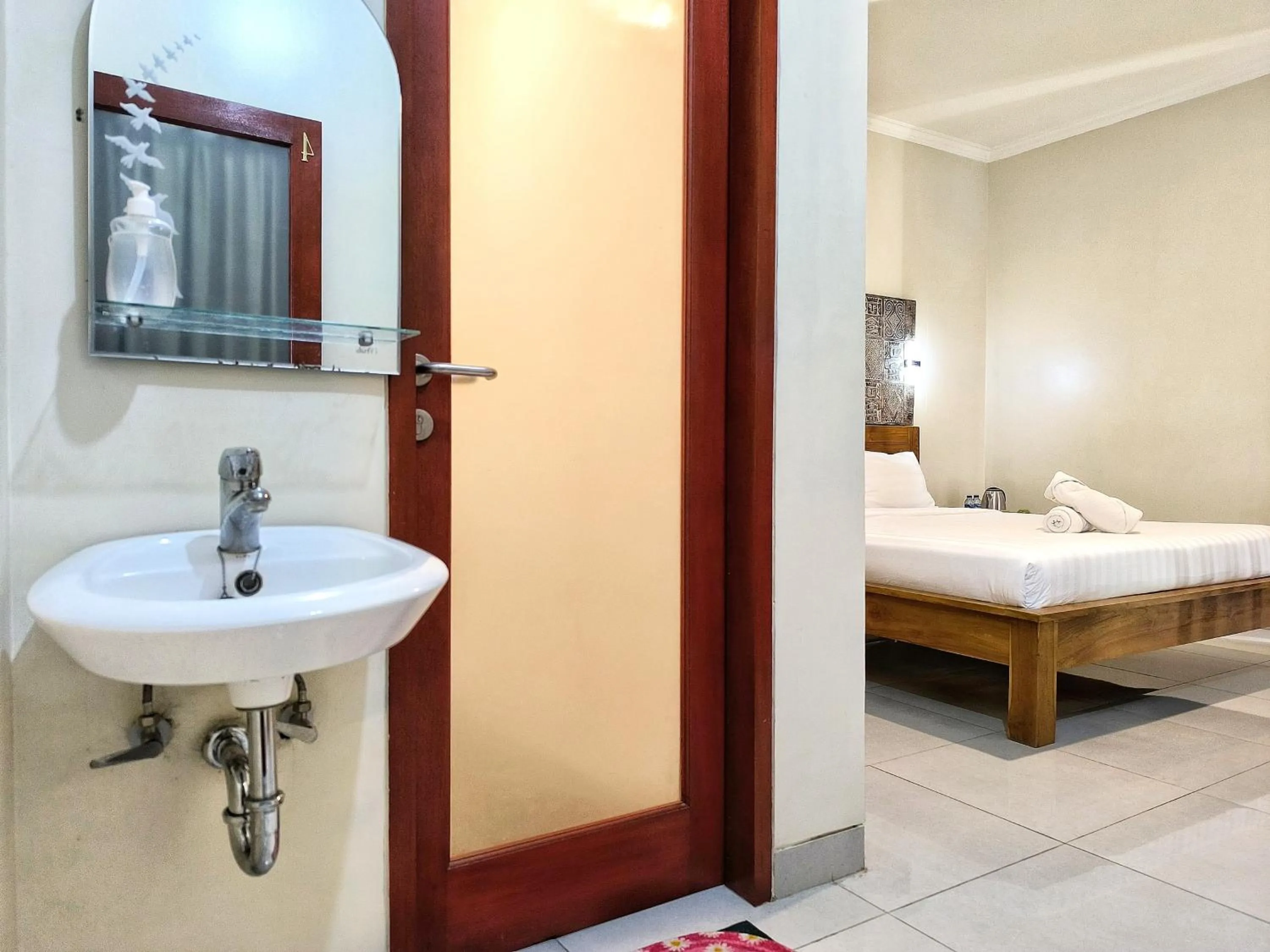 Toilet, Bed in Alam Canggu Kuta by ABM