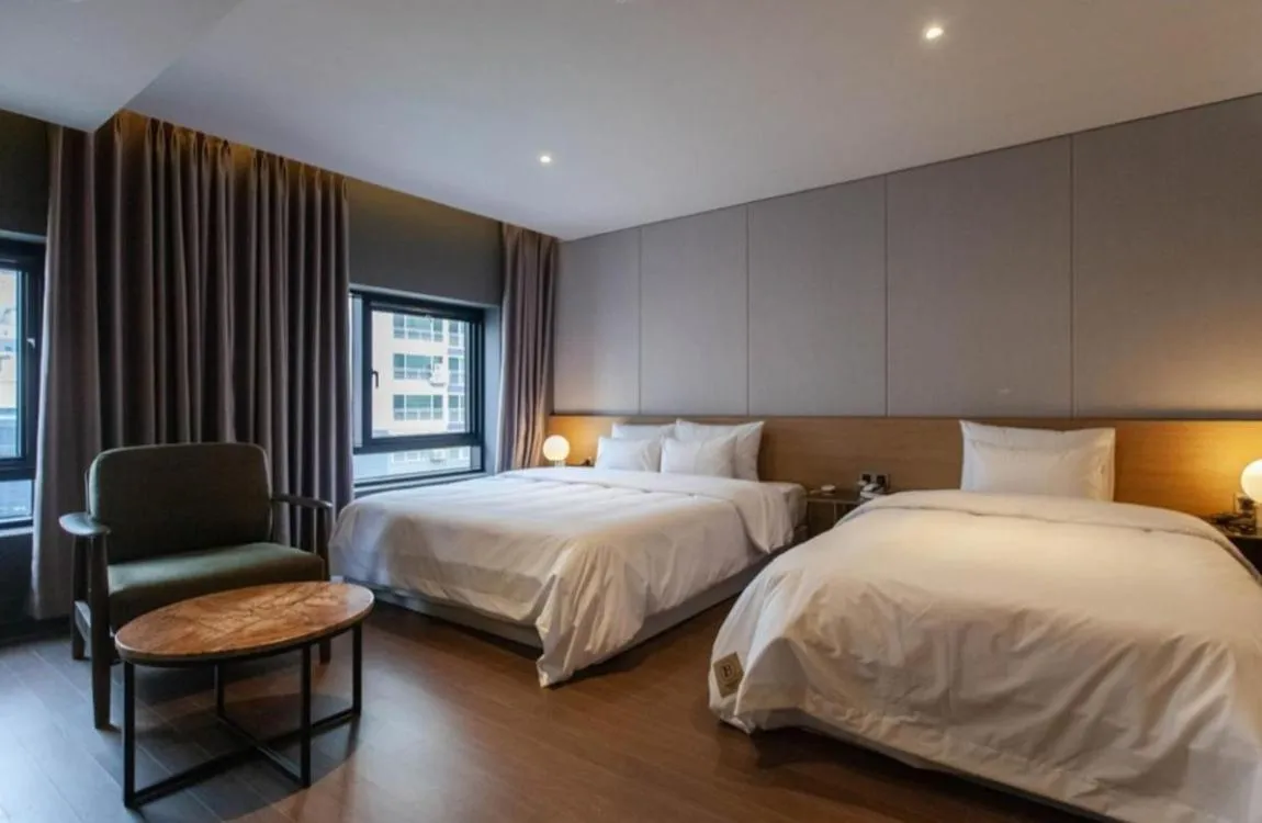 Bed in Brown Dot Hotel Hadan