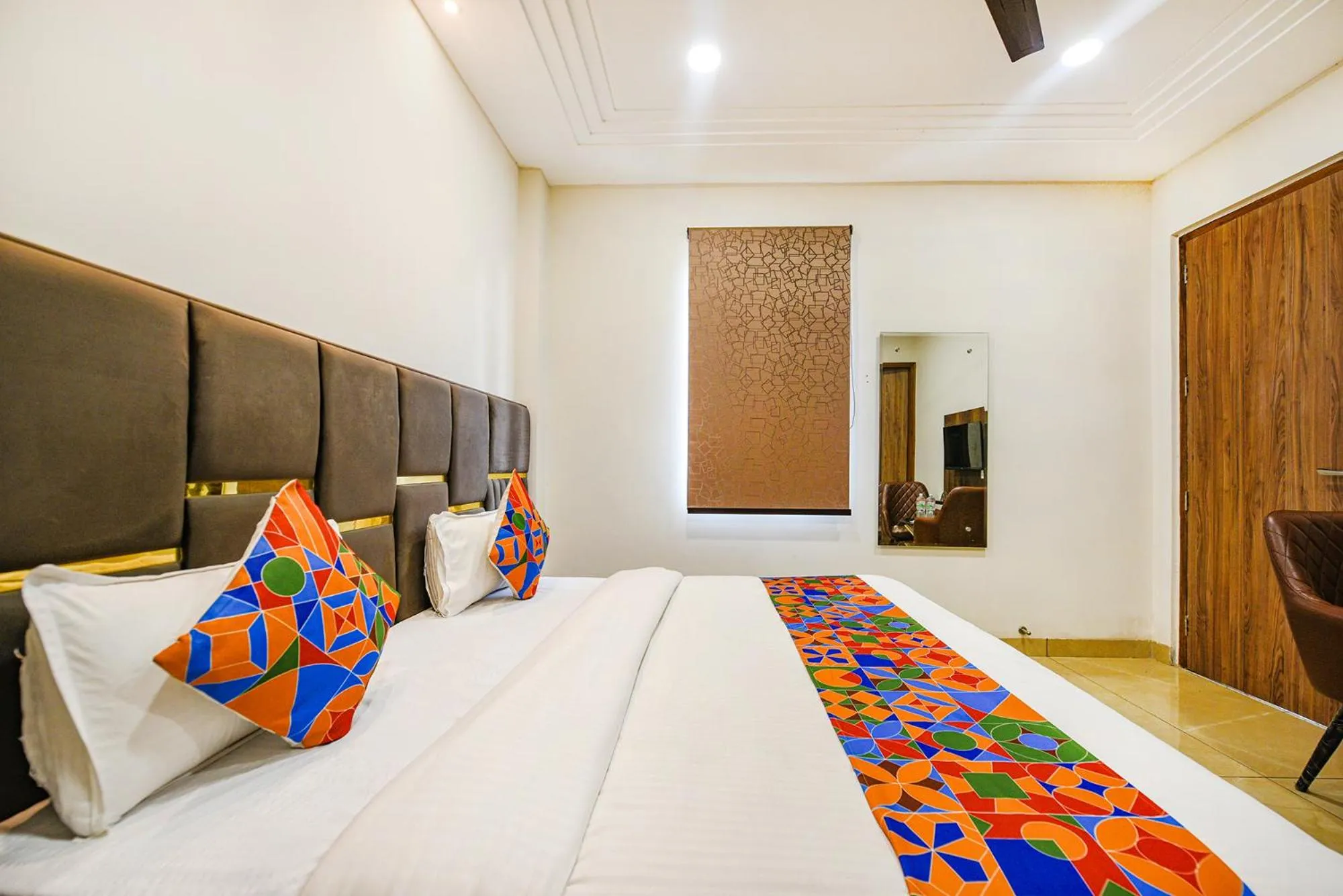 Bed in FabHotel Globe Inn